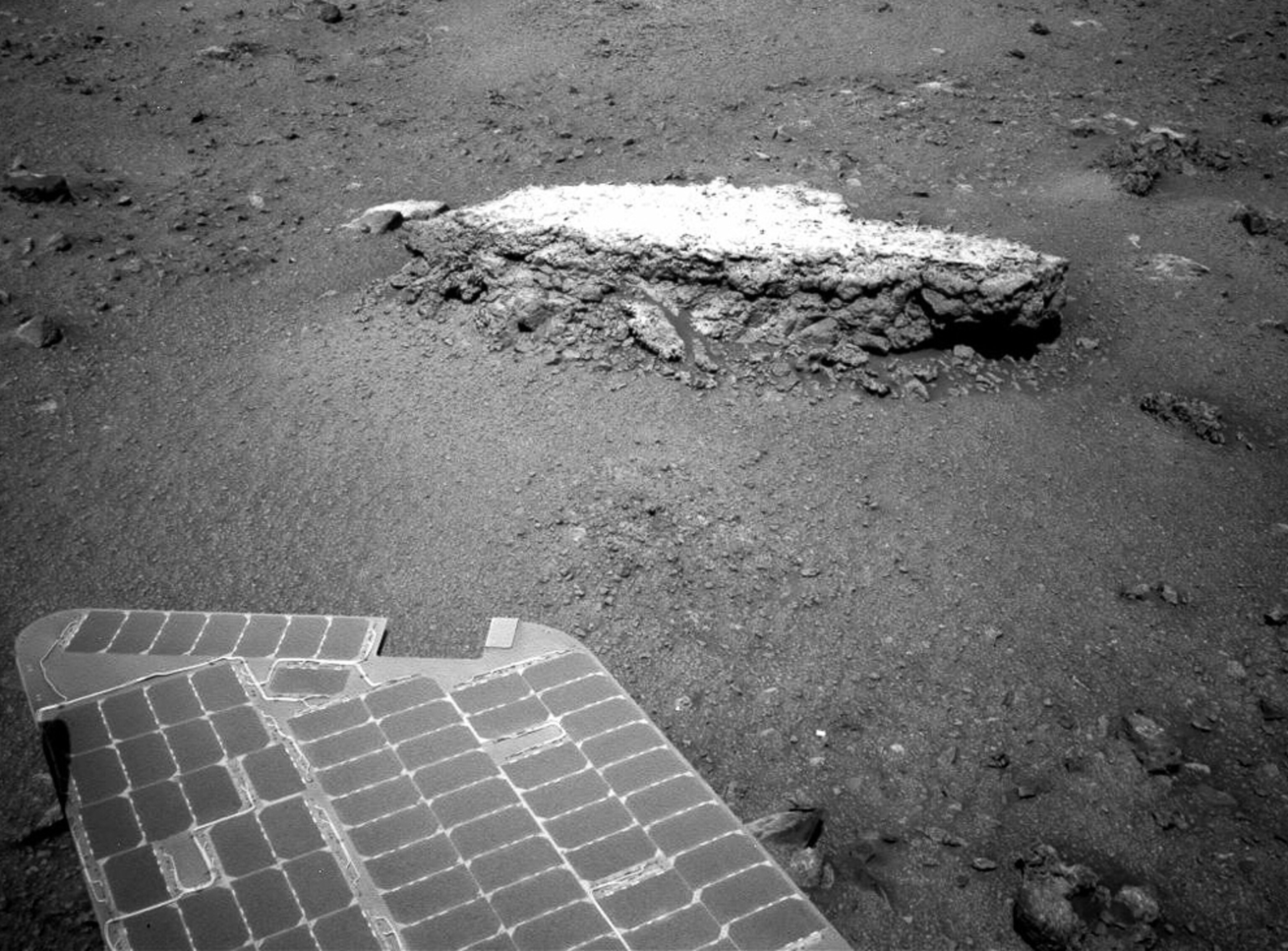 a rover near a rock on Mars known as Tisdale 2