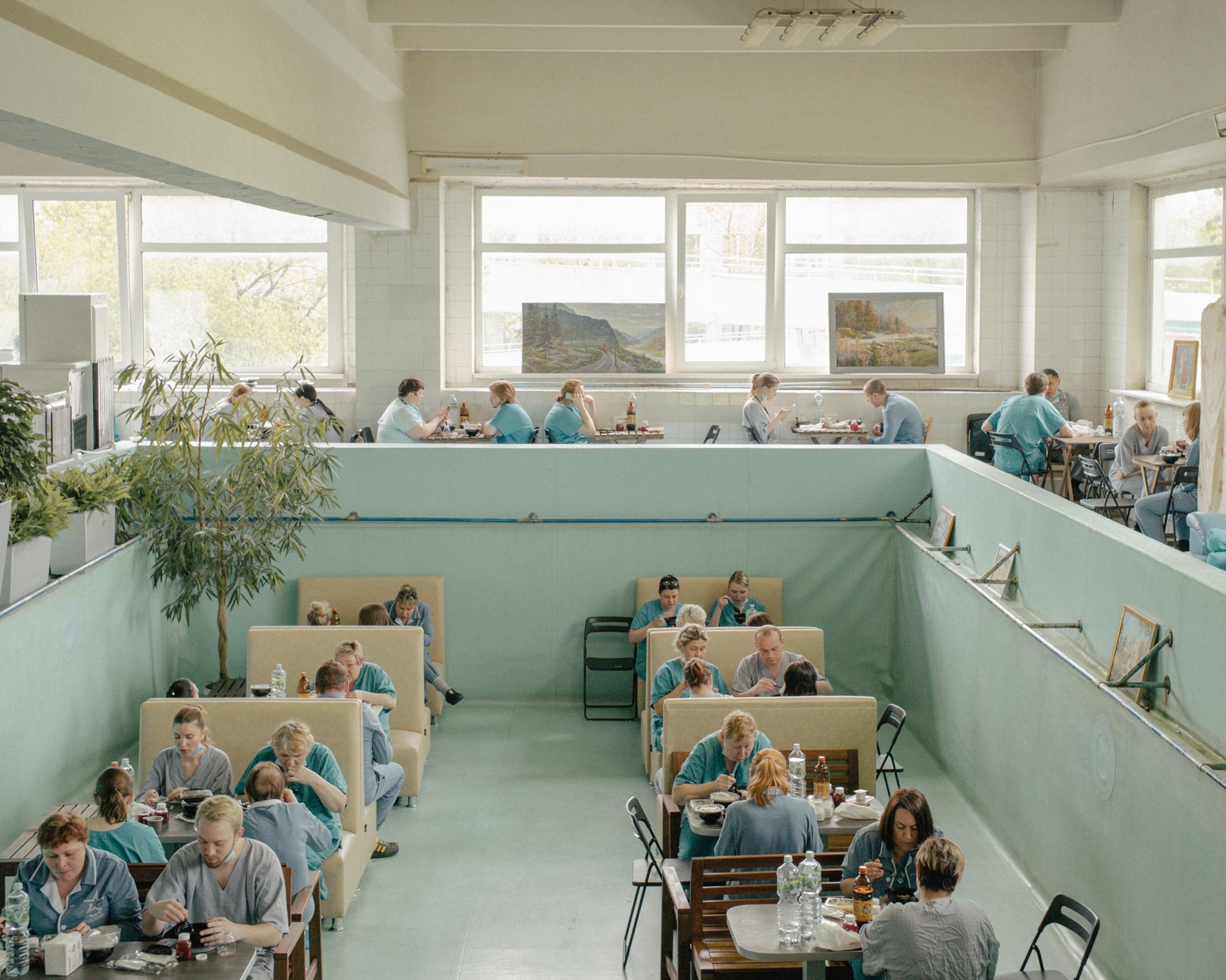 clinical workers eating in a canteen