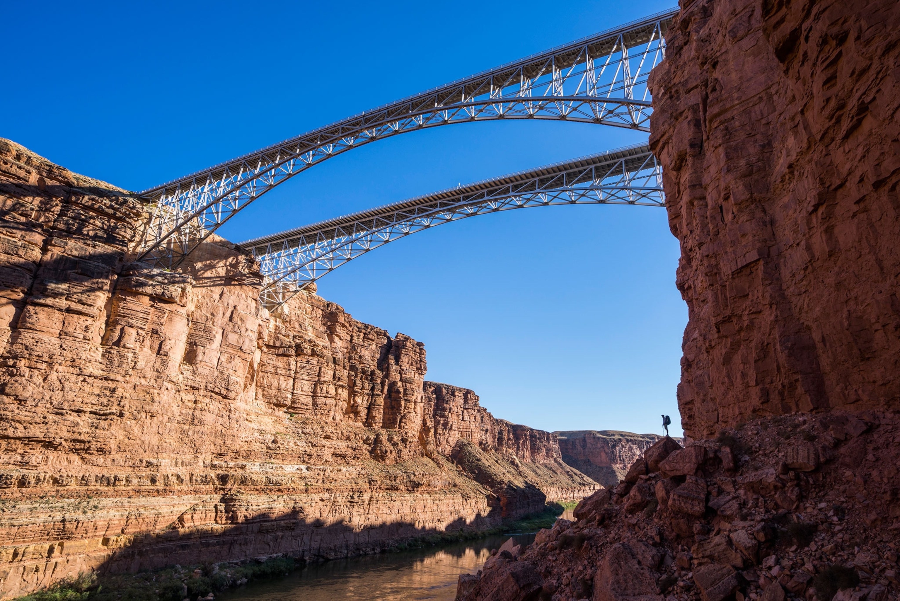 Kevin Fedarko standing below Navajo Bridge inside Marble Canyon