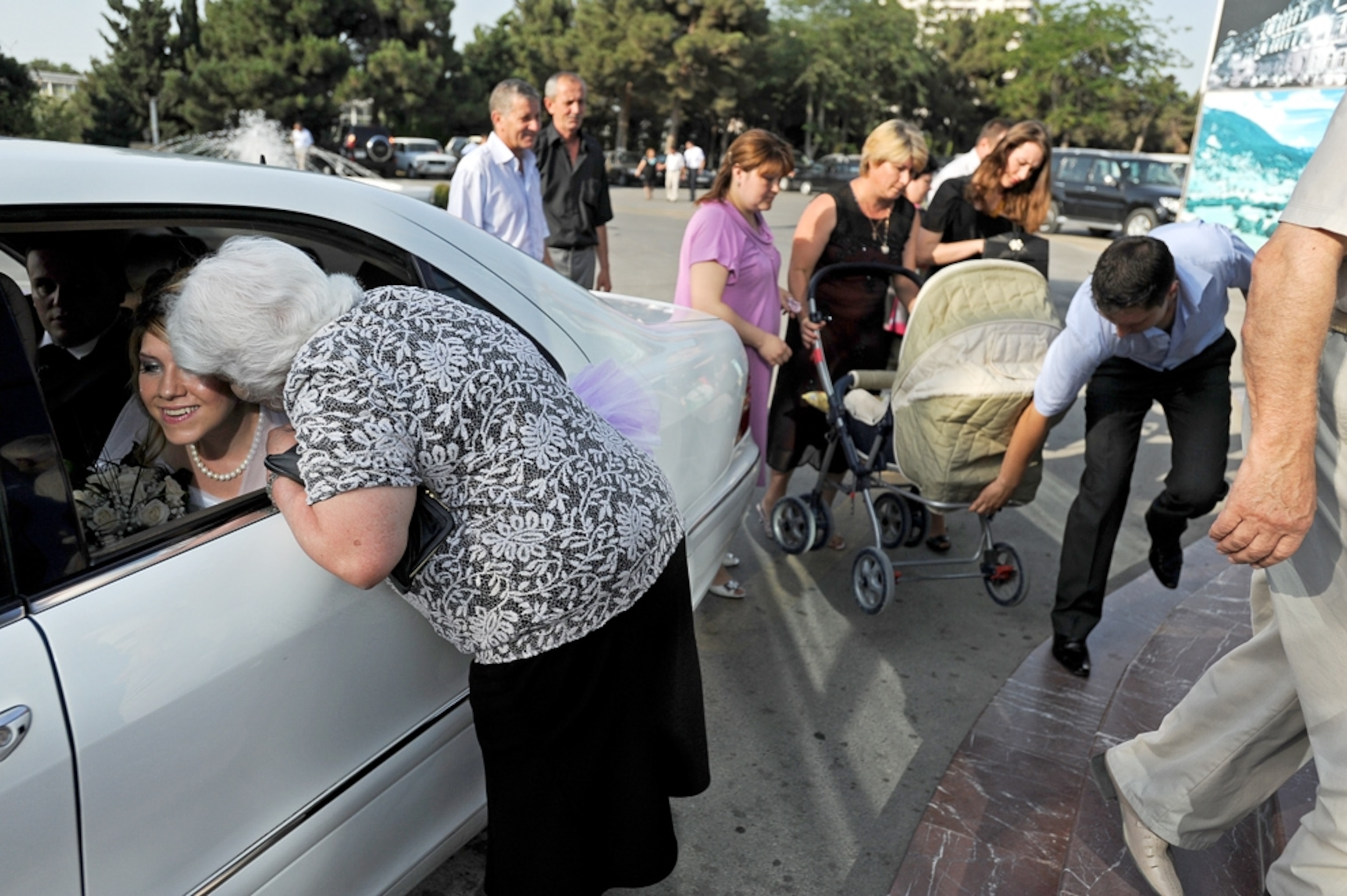 A bride arrives at a wedding hall in Baku, Azerbaijan