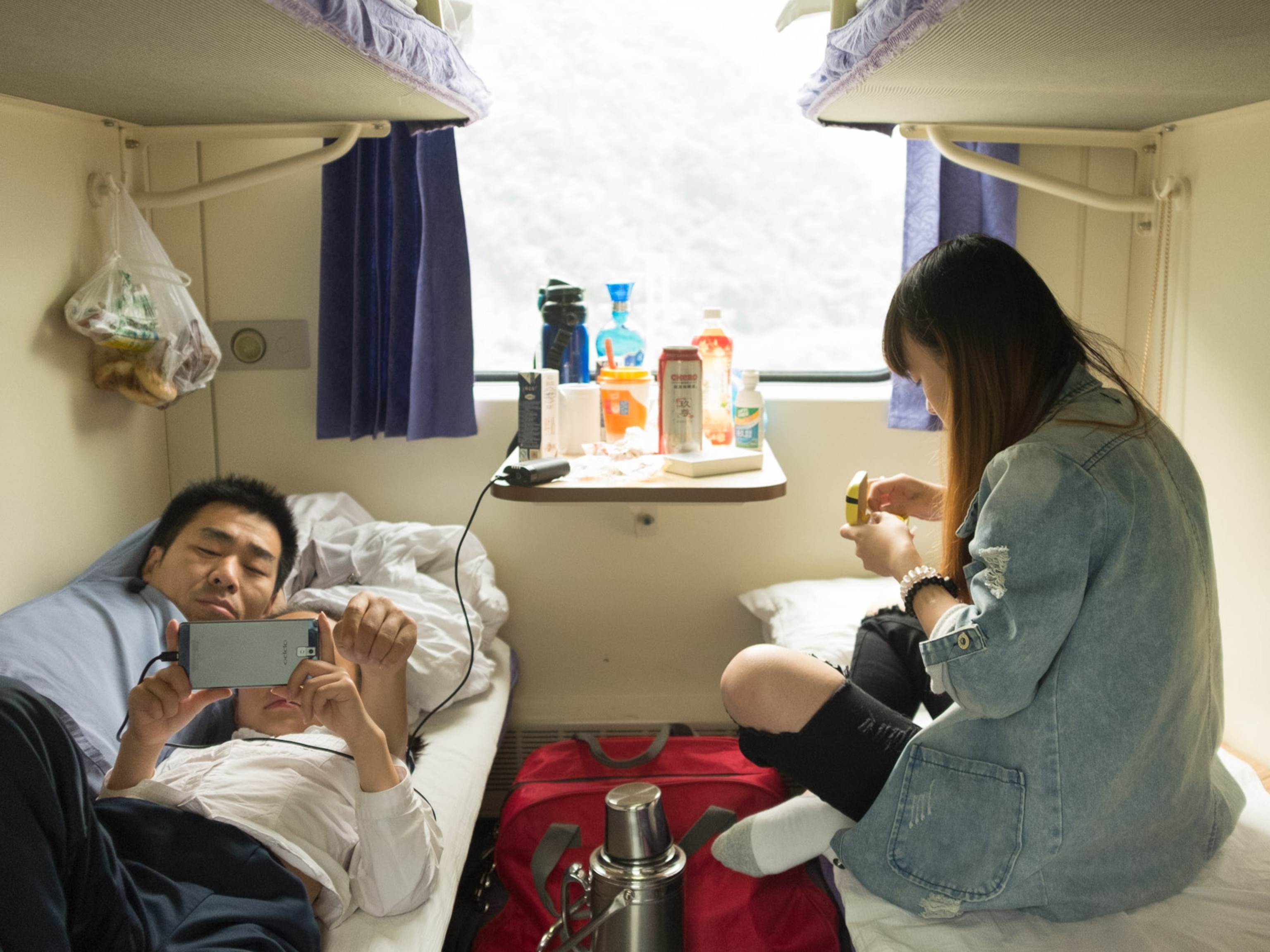 mother, father and daughter in sleeper car