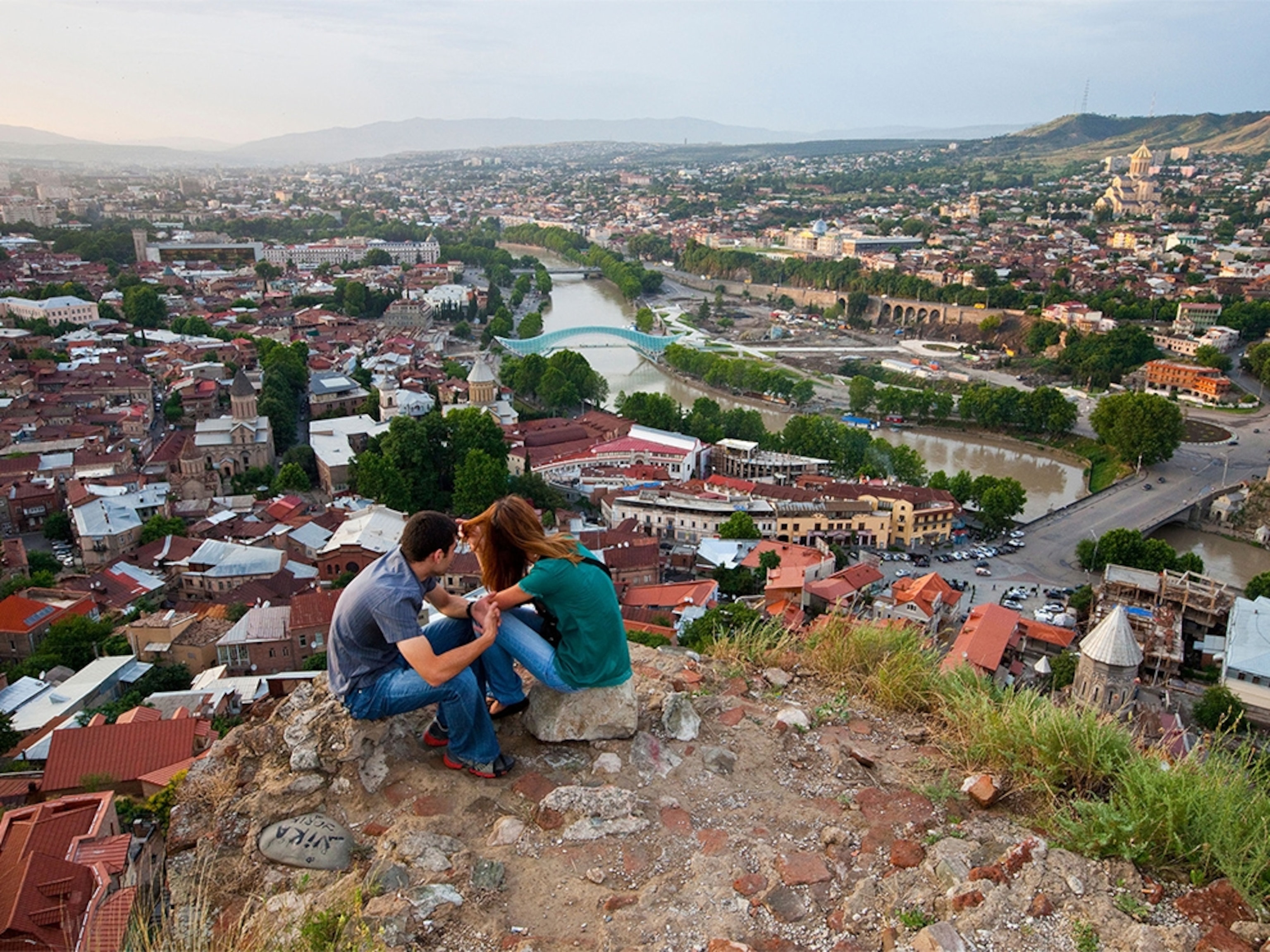 a couple on an overlook in Tbilisi, Georgia