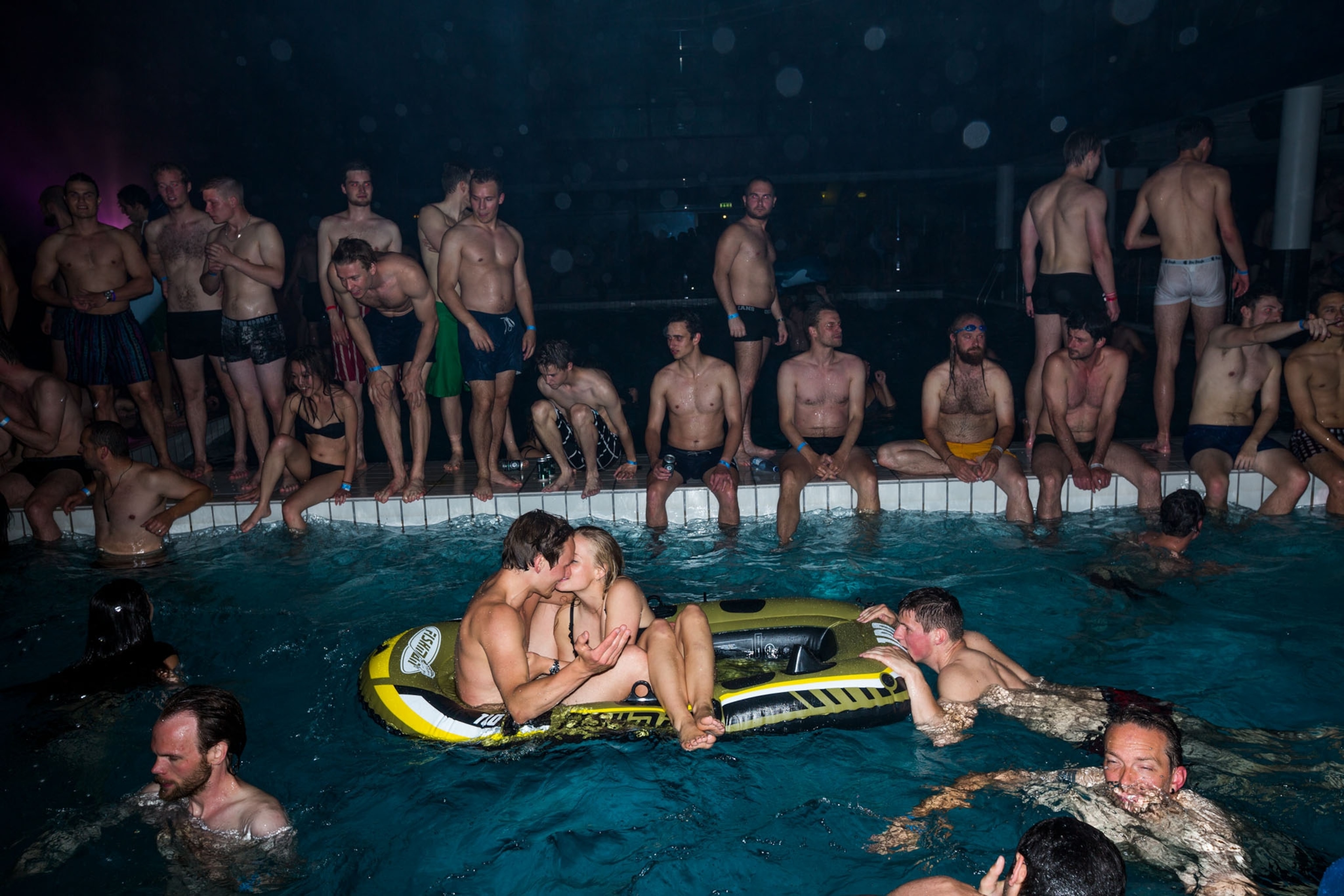 streetparty crowd taking a midnight-swim, Distortion Street Festival, Denmark.