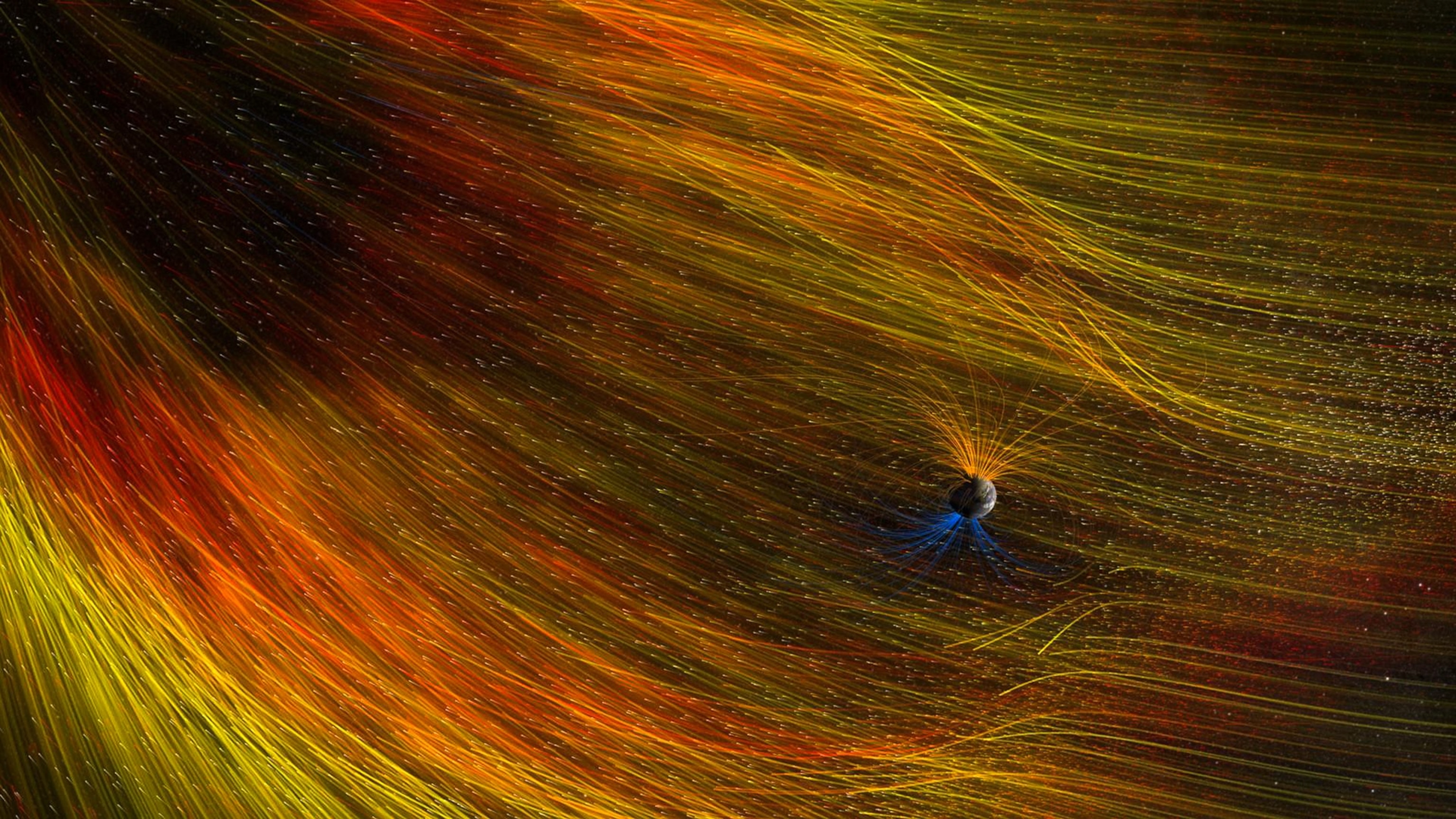 Space picture: An illustration showing solar particles being deflected by Earth's magnetic field