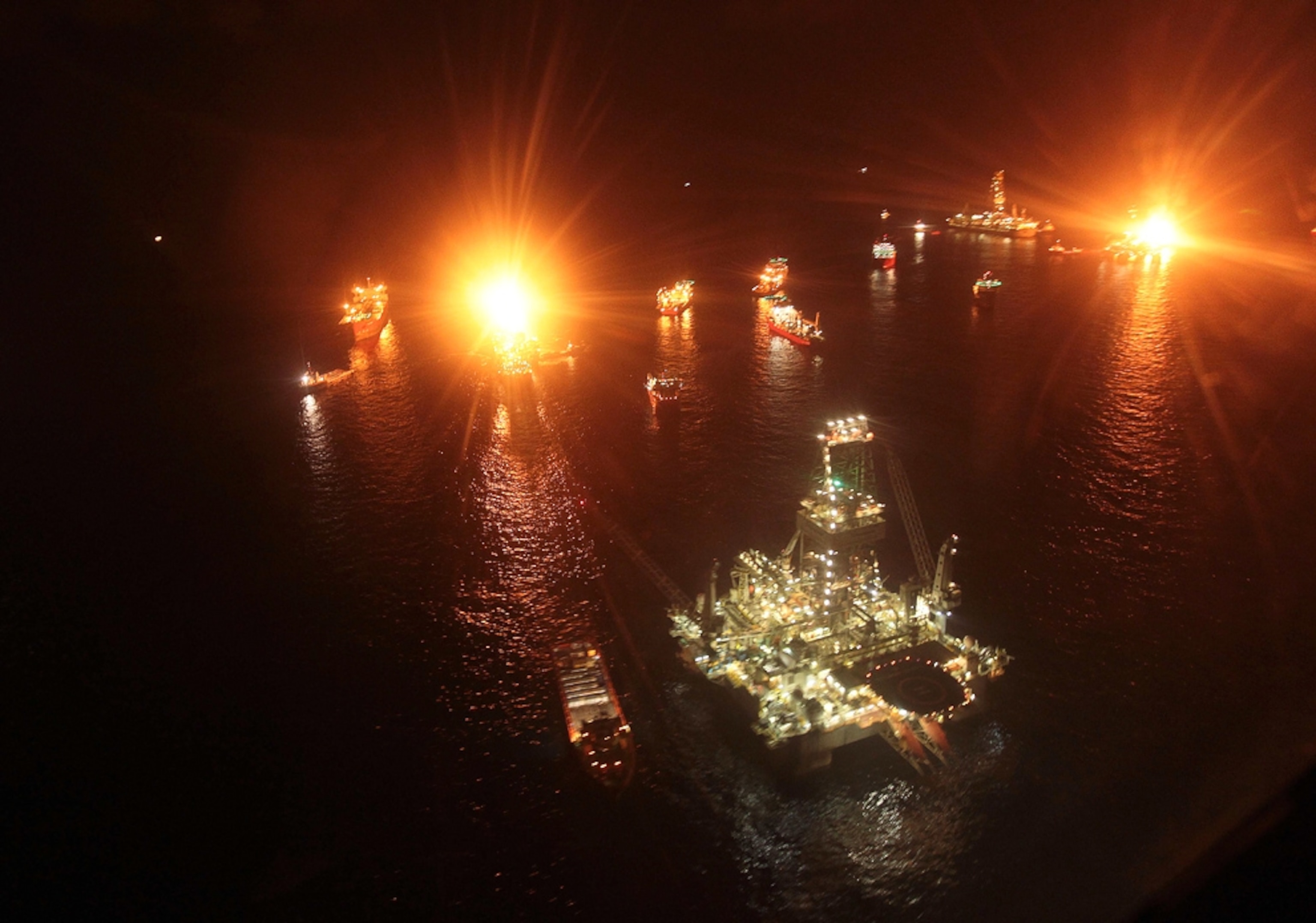 vessels above the BP Deepwater Gulf of Mexico oil spill site, where a new cap has been fitted to the leaking wellhead