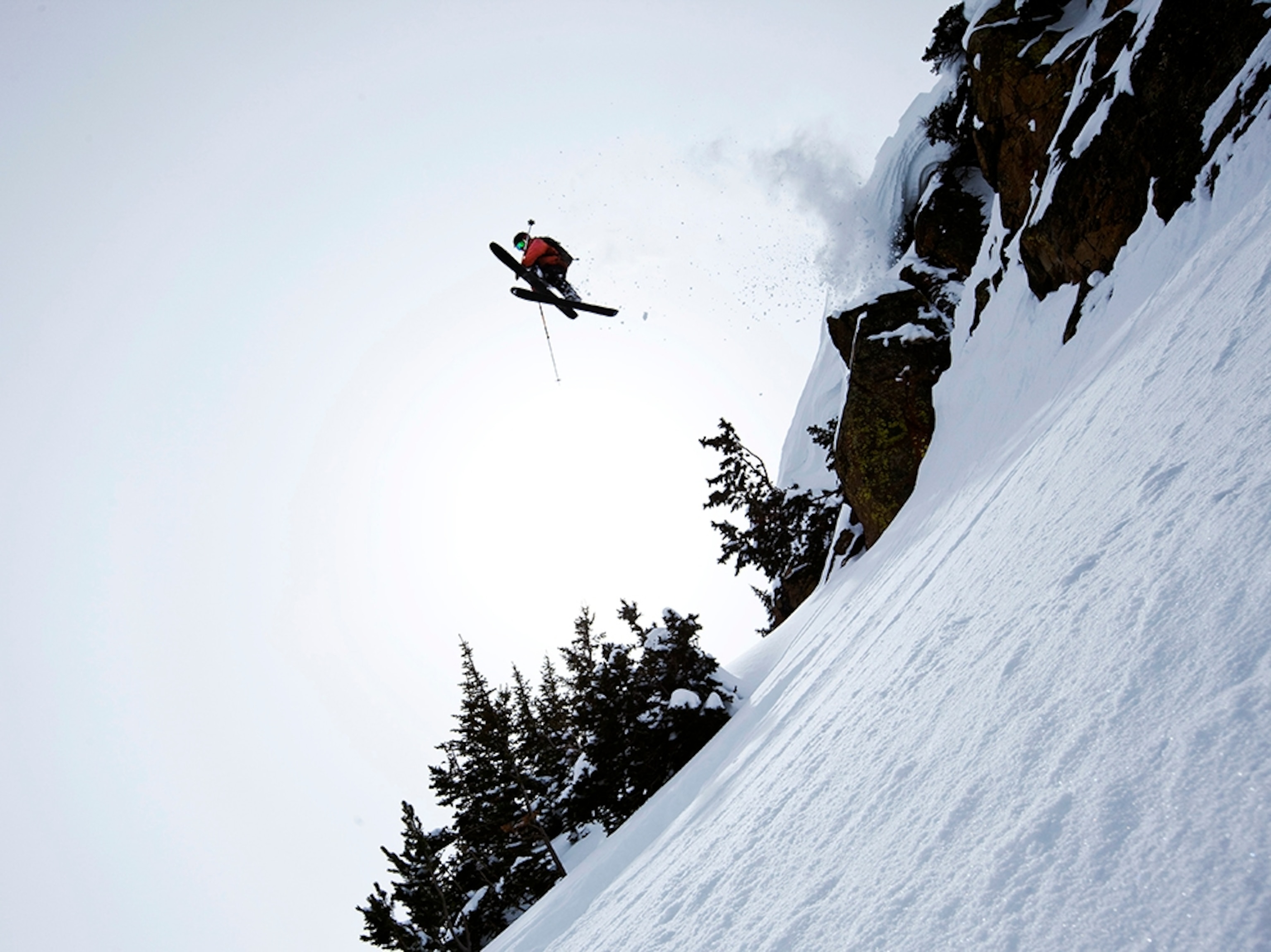 a skier jumping off a cliff, Cooke City, Montana
