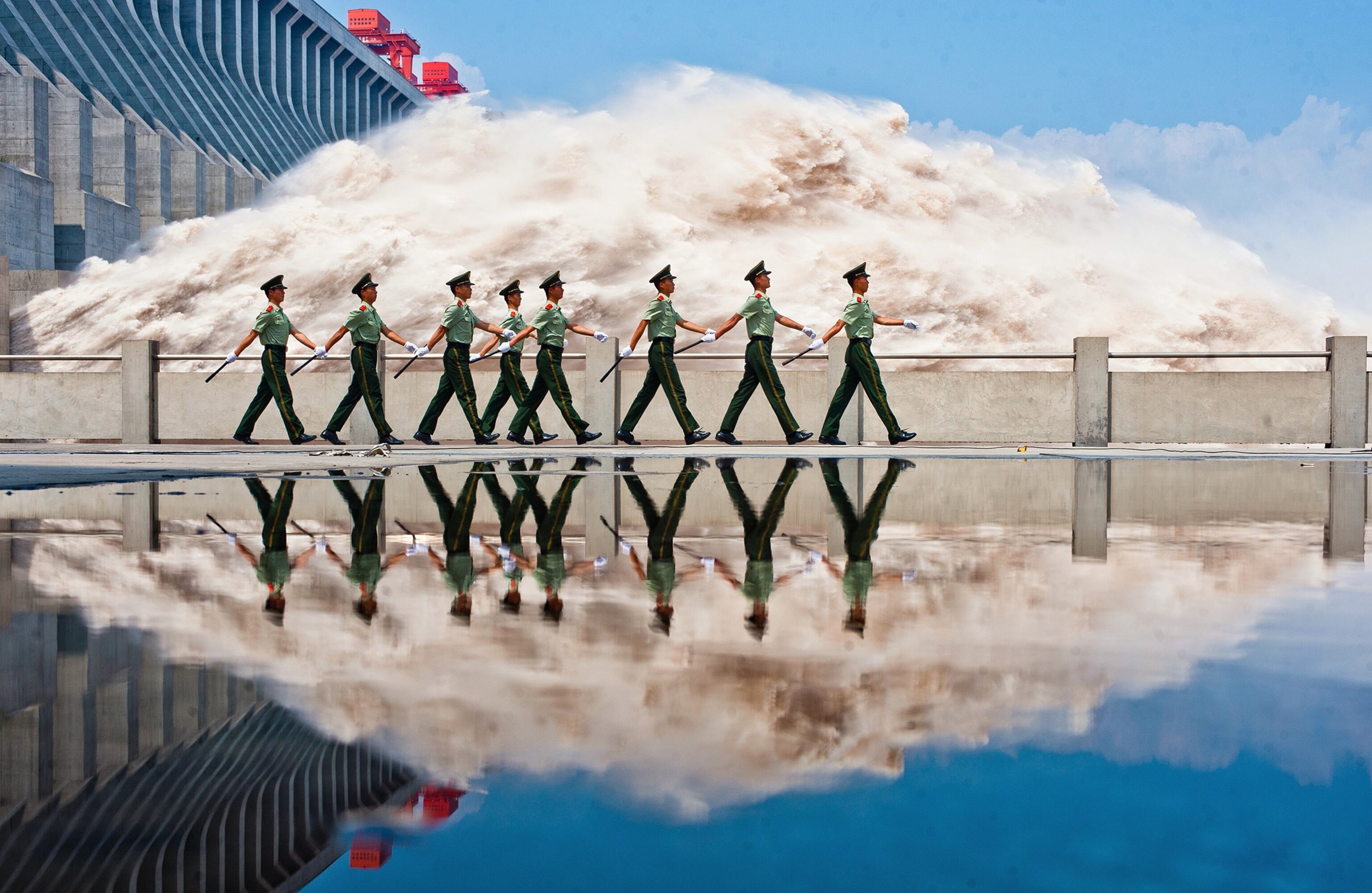 Police patrolling the Three Gorges Dam picture: for best pictures of the month gallery