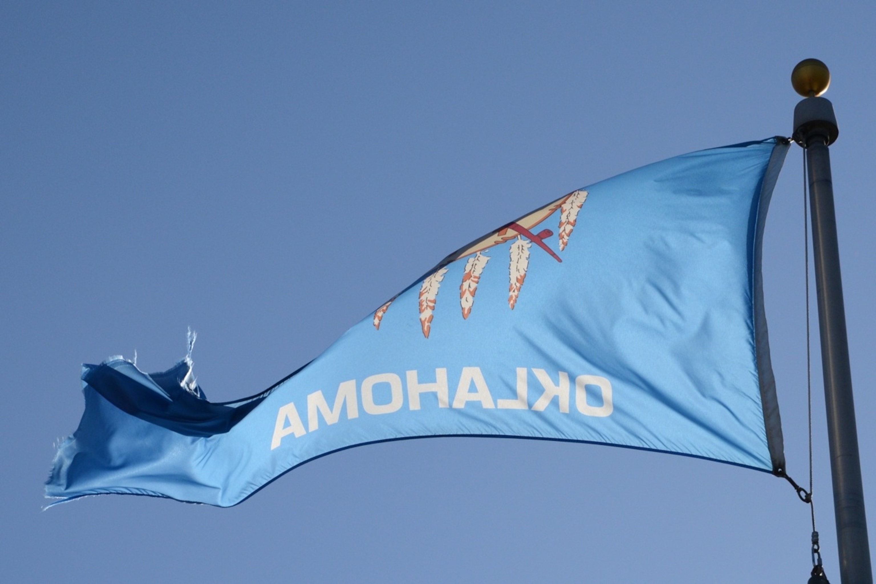 The Oklahoma flag portrays five feathers representing the five Native American tribes that were relocated to Oklahoma. (Photo by Andrew Evans, National Geographic Travel)