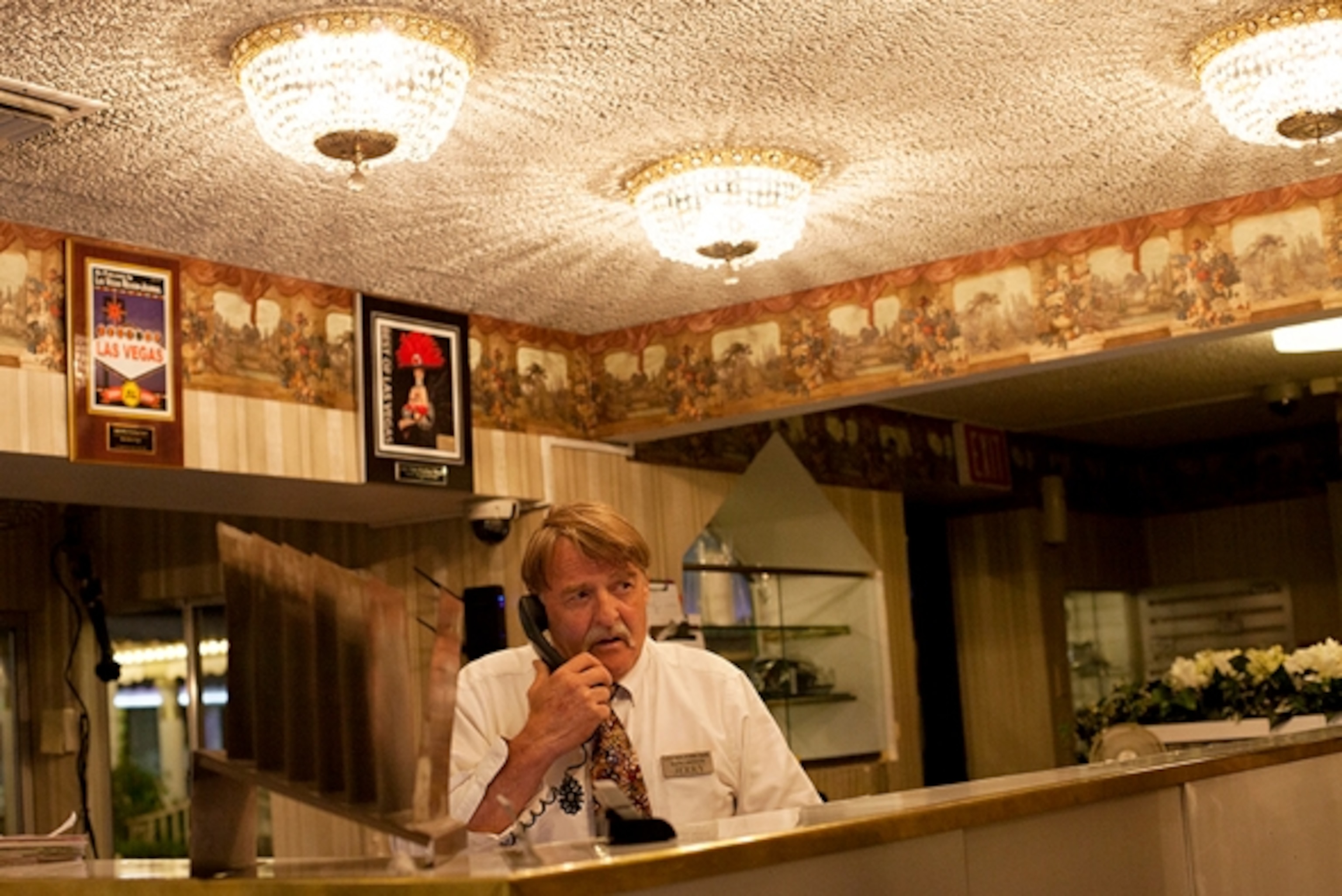 Jerry Warrell manning the front desk. (Photograph by Annie Agnone)