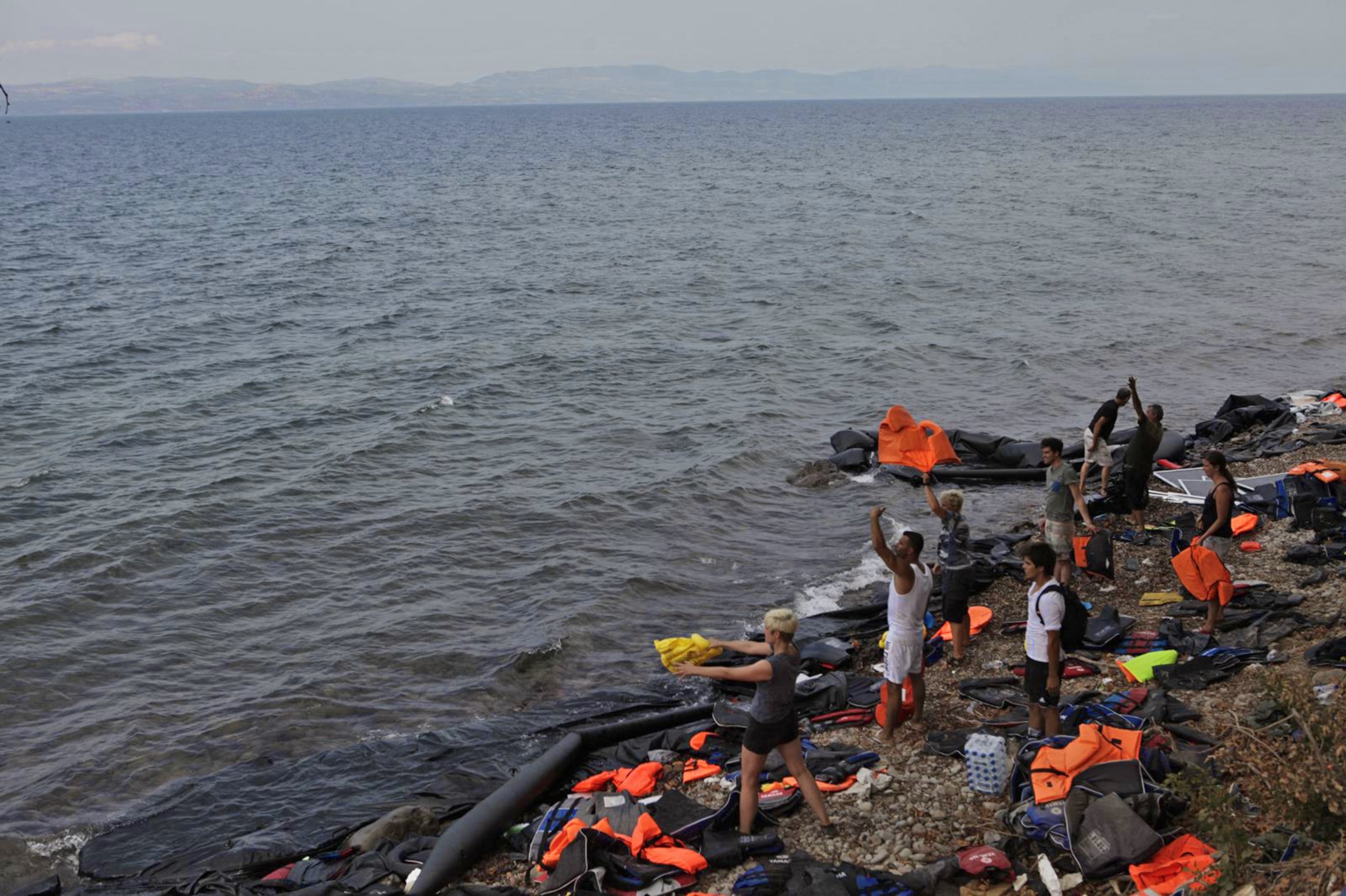 refugees on the shore of Lesvos