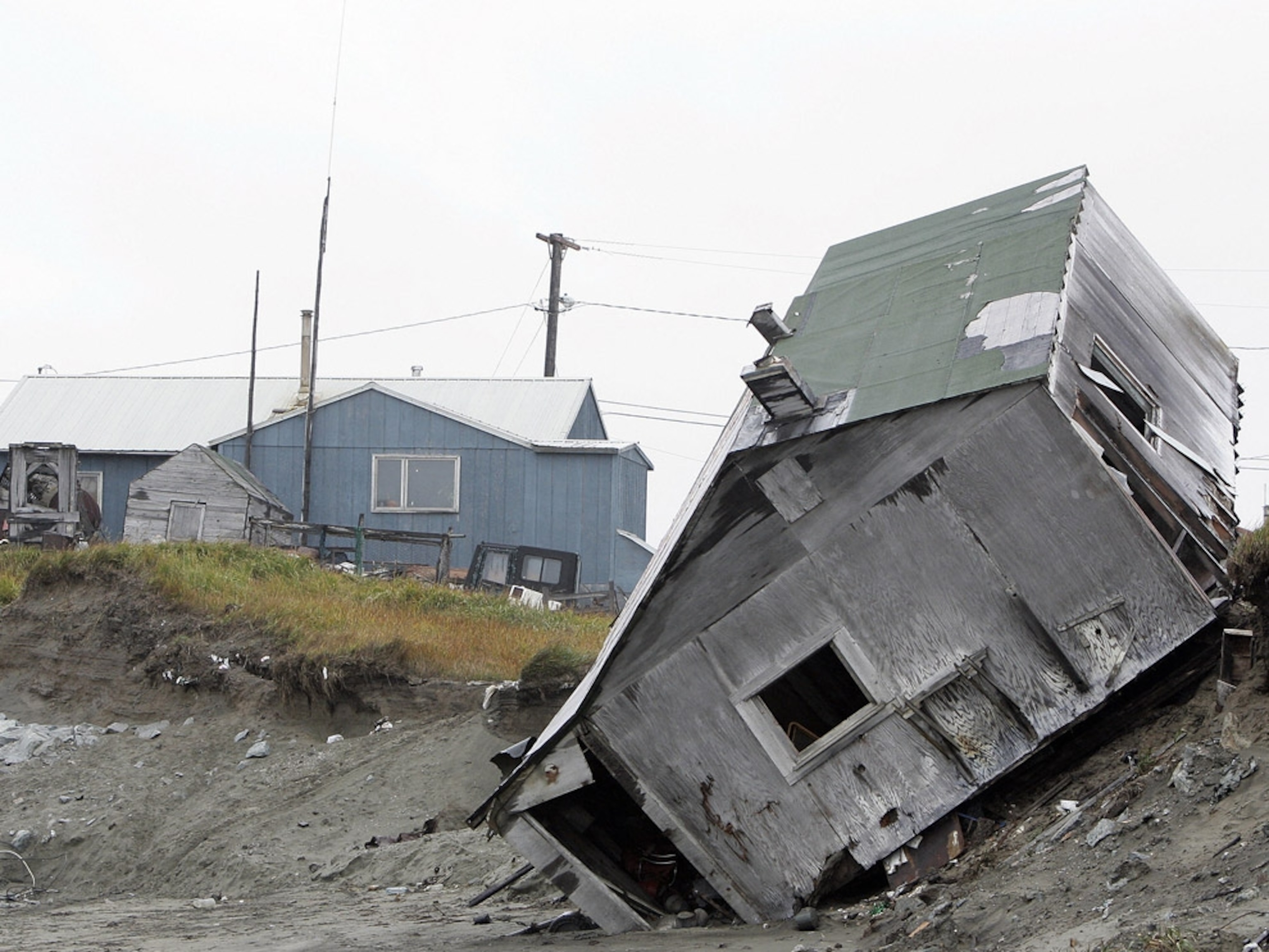 House toppled by erosion