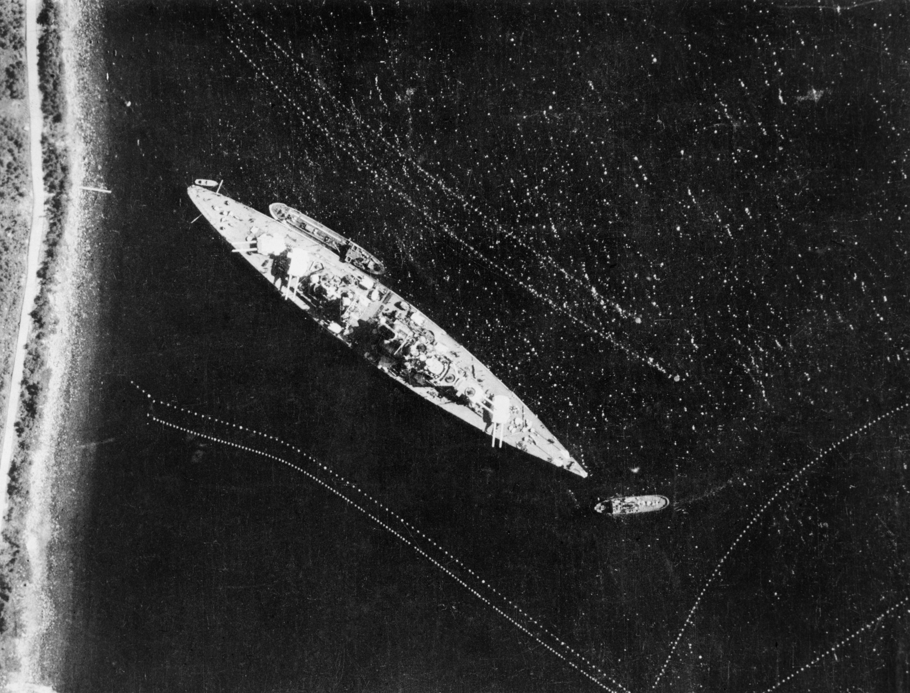Operations By The Photographic Reconnaissance Units, 1939-1945, Vertical photographic-reconnaissance aerial of the German battleship TIRPITZ moored in Narvik-Bogen Fjord, Norway, 17 July 1942.