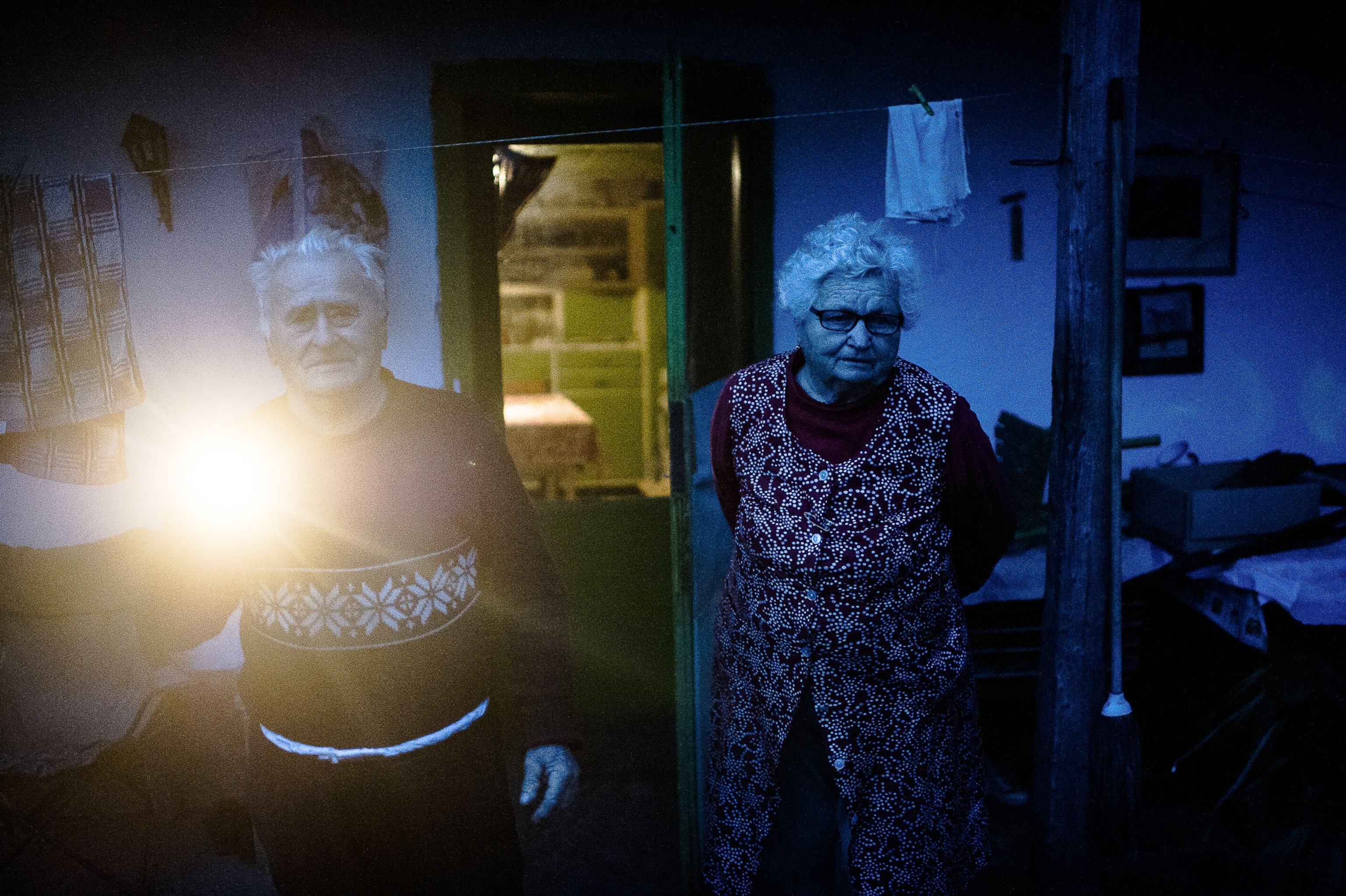 Aunt Kató and Uncle Jani use a flashlight and their TV is plugged into a battery, as their farm near Bicere lacks electricity.
