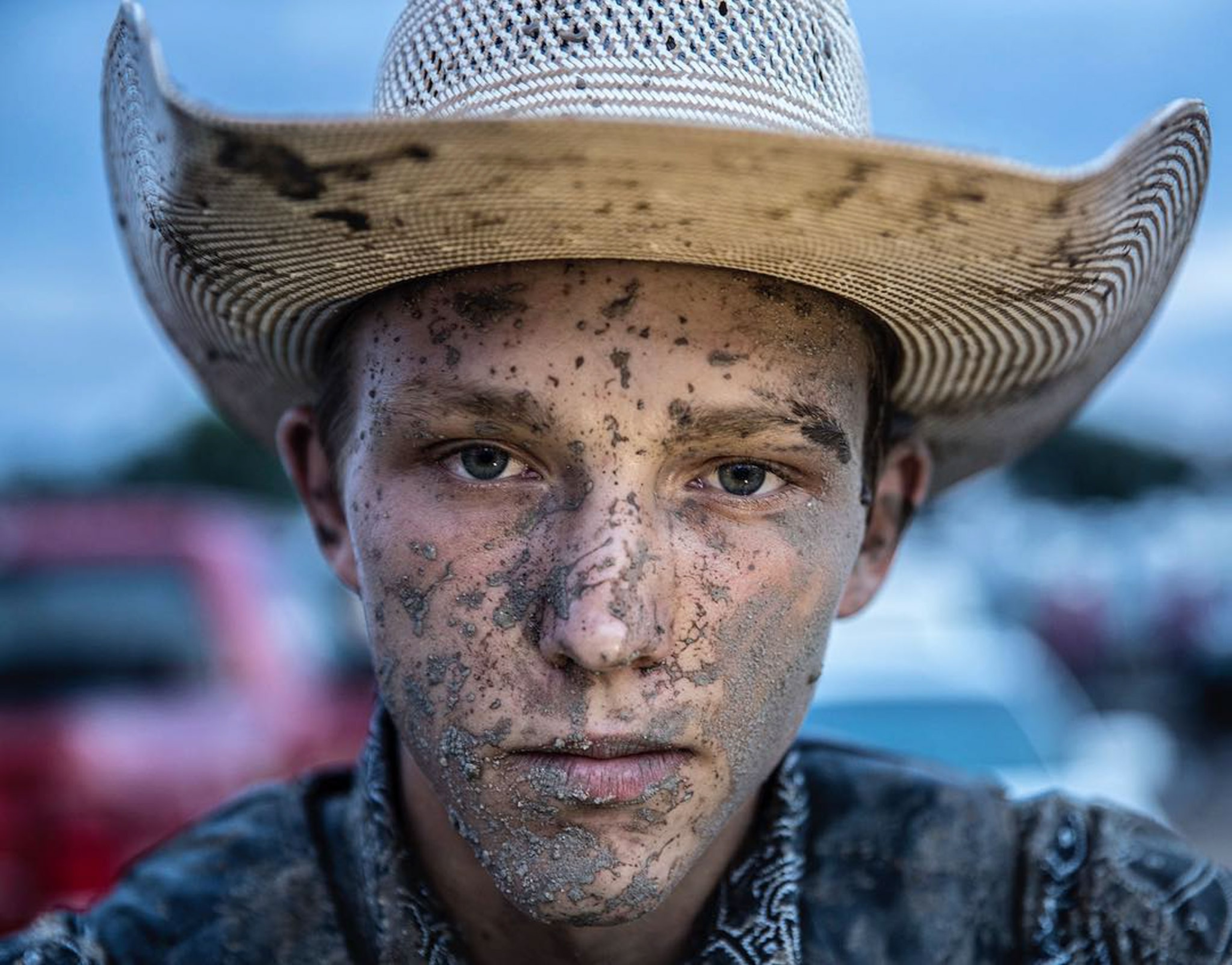 a boy wearing a cowboy hat