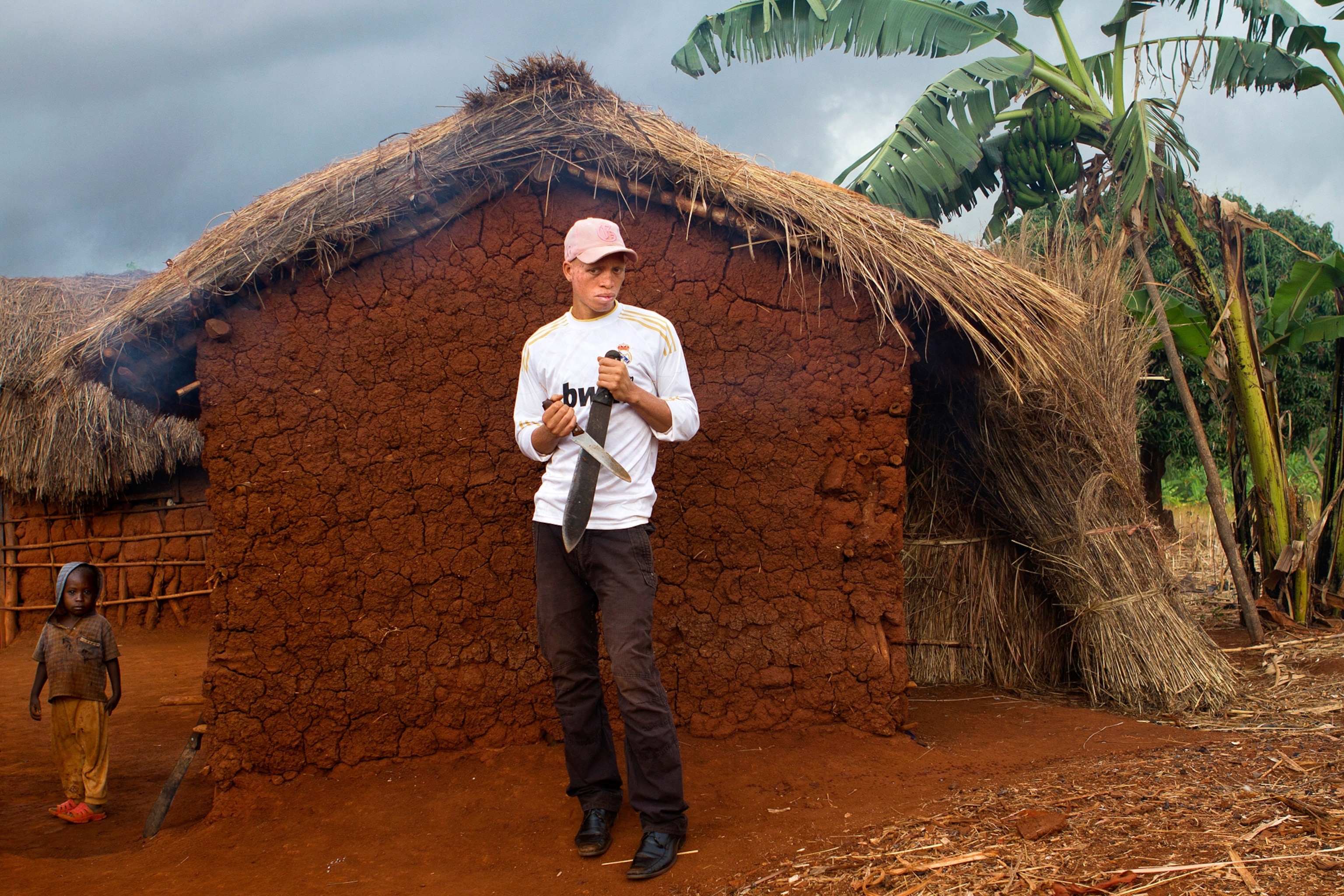 Nengo villager Maajabu Boaz with a knife, Tanzania