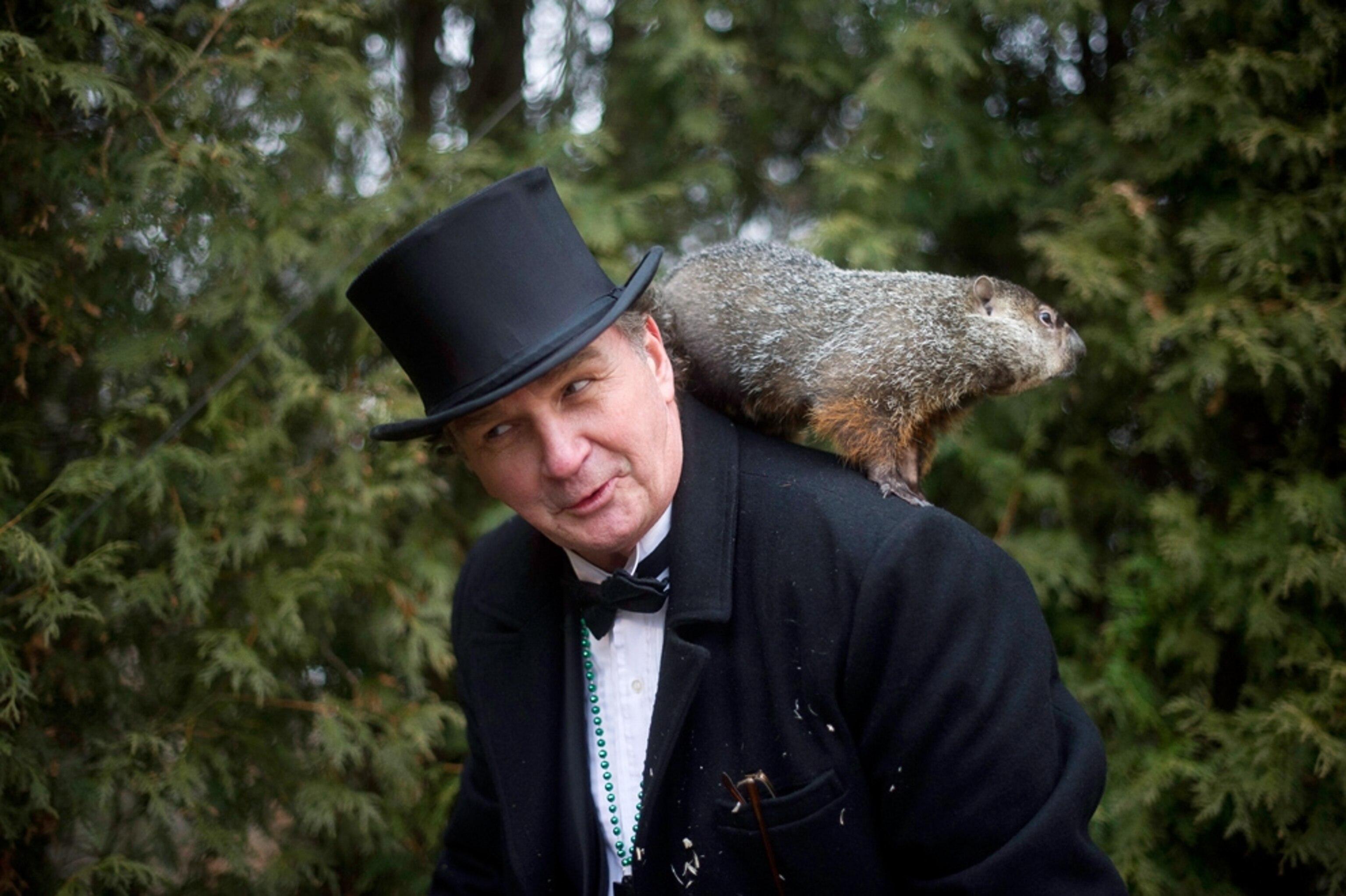 A groundhog and his handler.