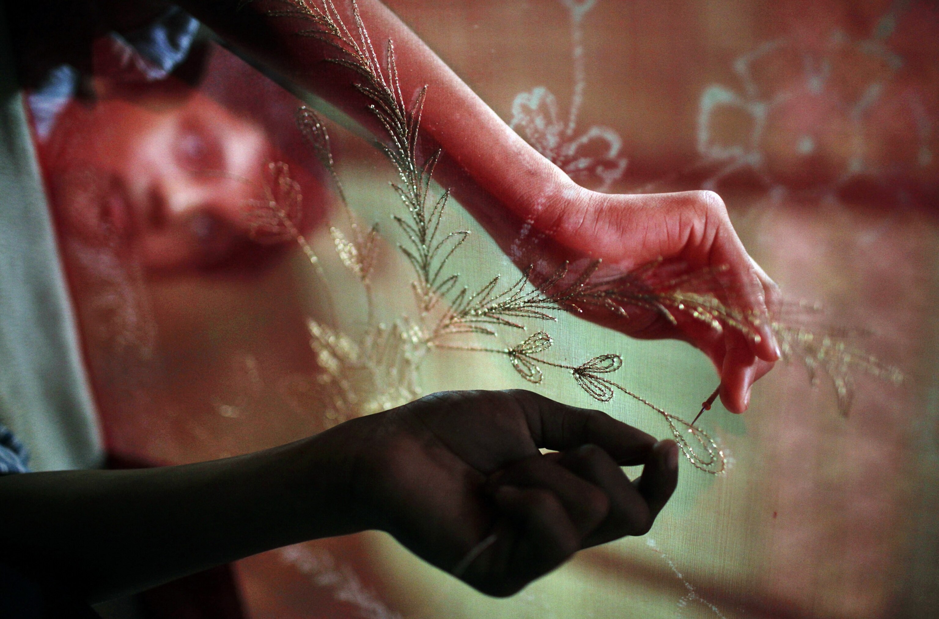 child labor picture: Indian boy in Nepal sari factory -- for best pictures of the month gallery