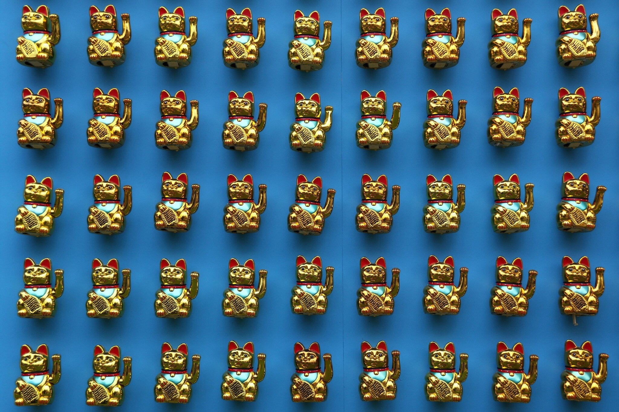 The fascinating history behind the popular 'waving lucky cat'