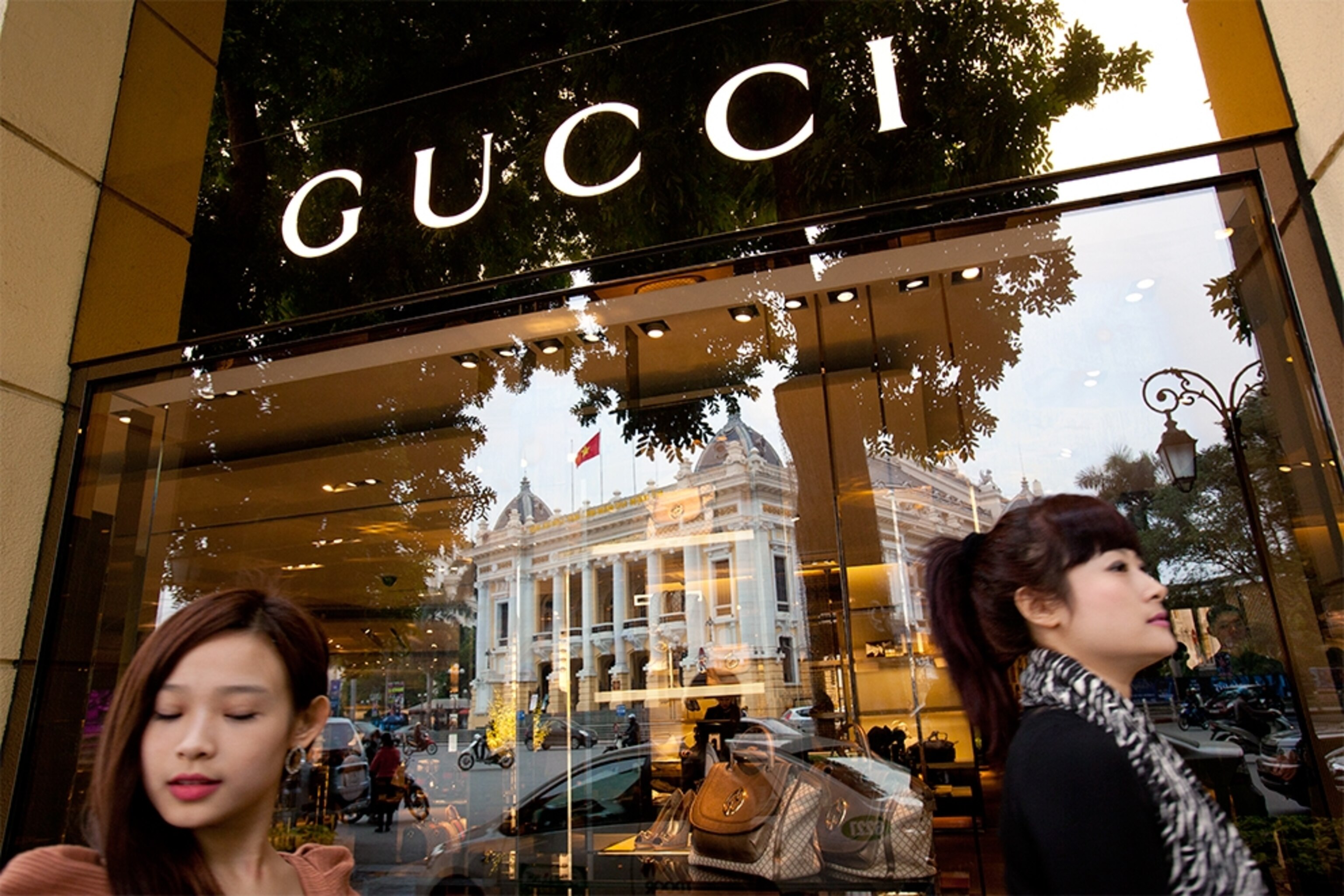 women outside the Gucci store in Hanoi, Vietnam
