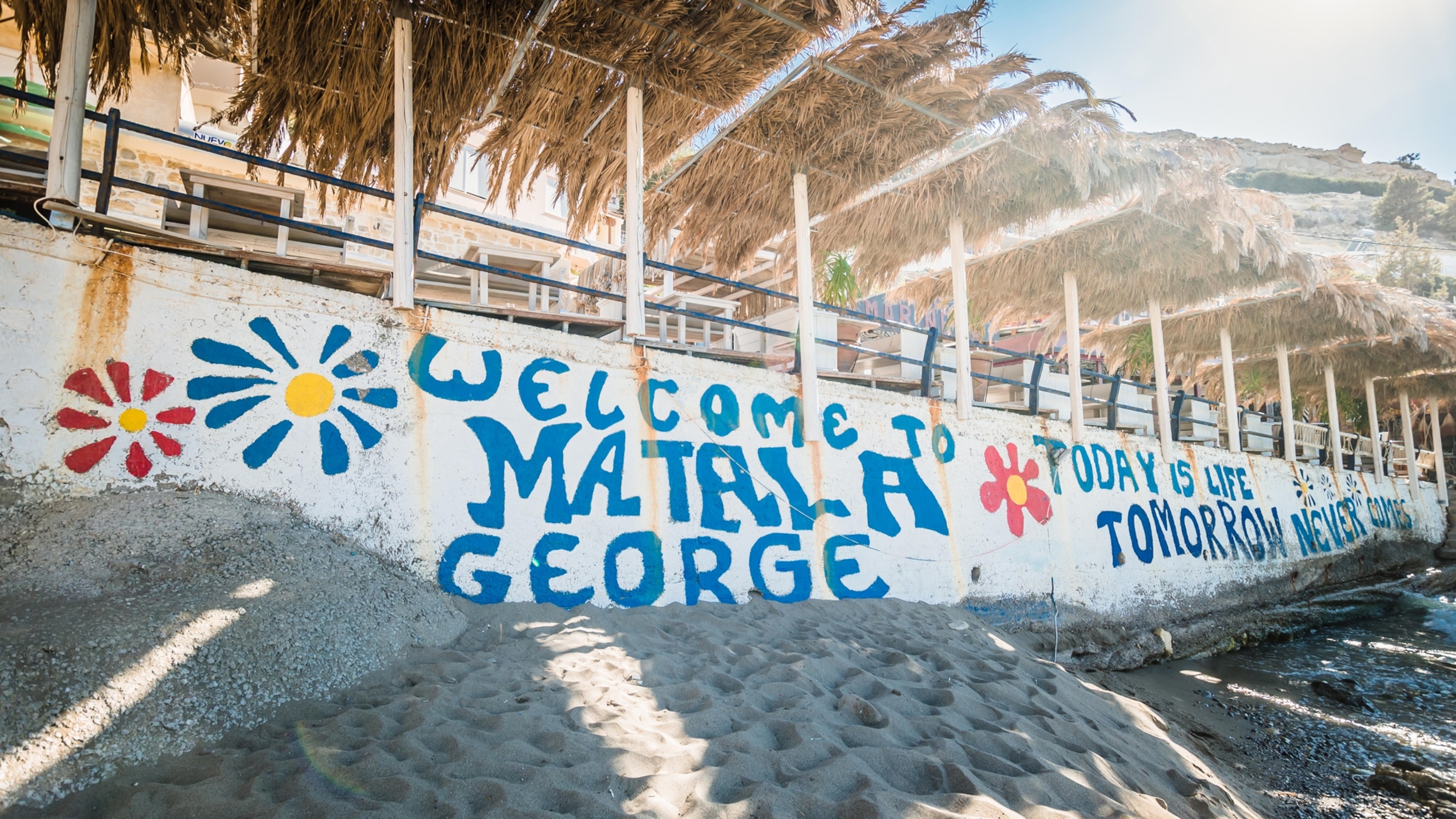 Crete, Greece: June 30, 2016: Hippies logo on the Matala beach in Crete island.