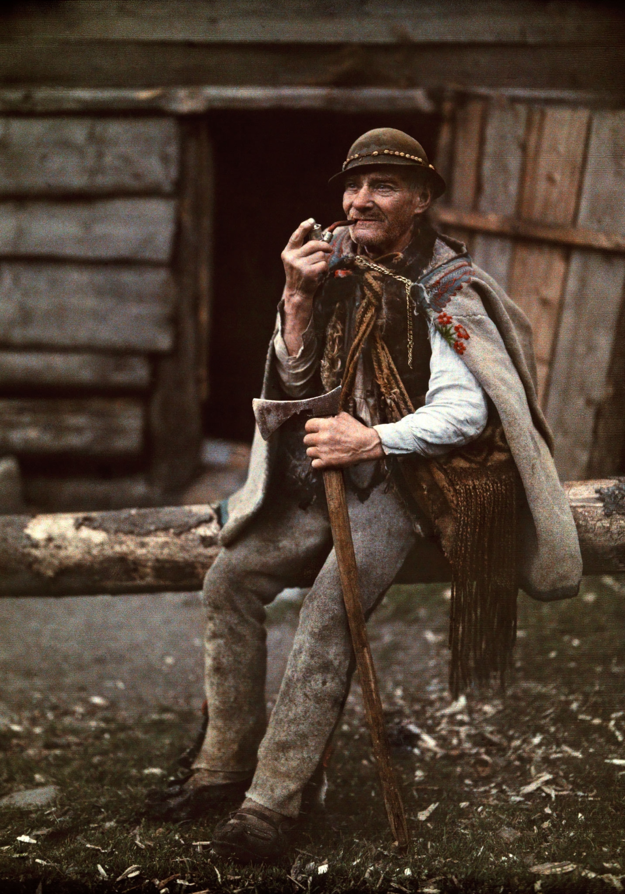 Polish man with pipe and axe