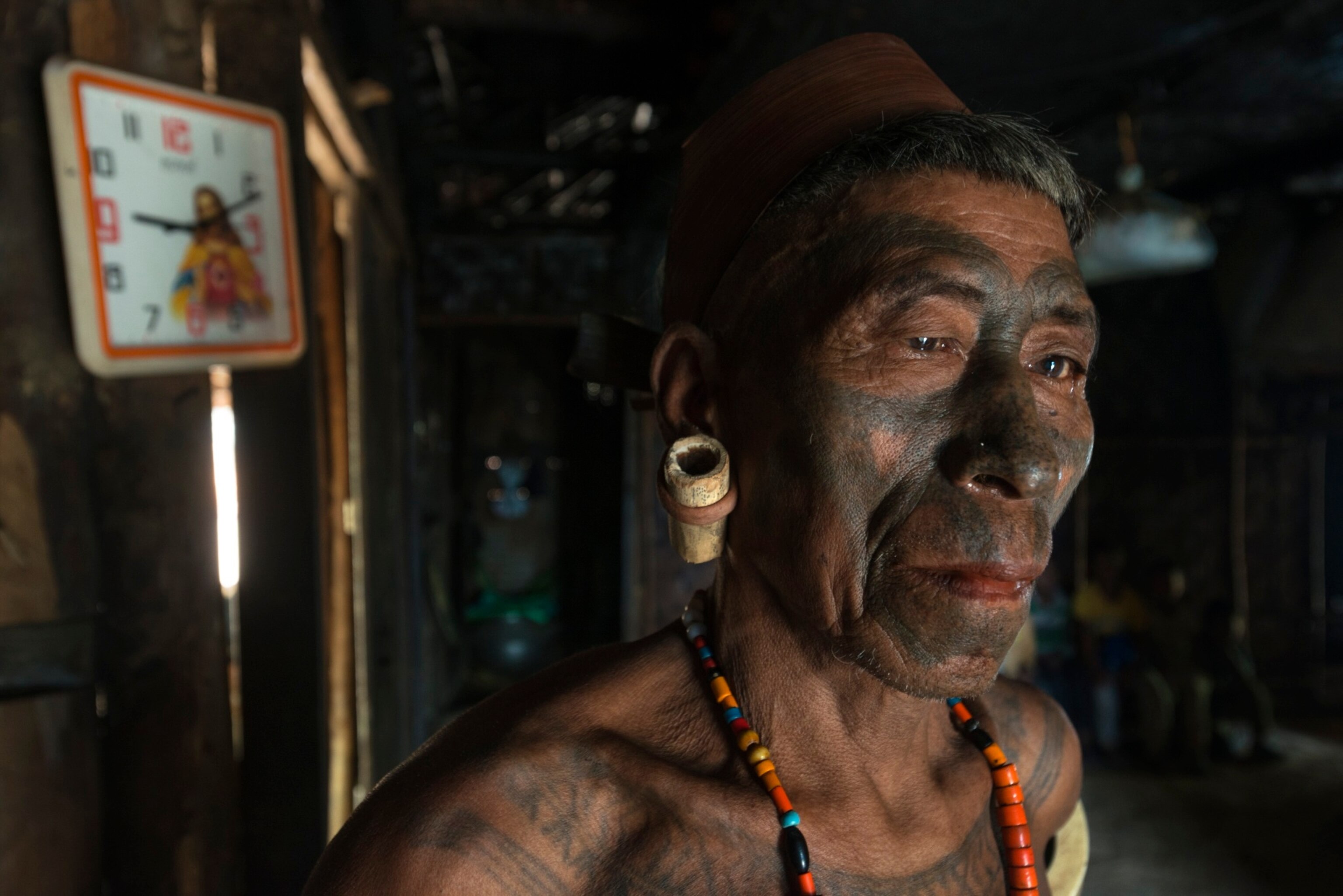 naga headhunter with face tatoos