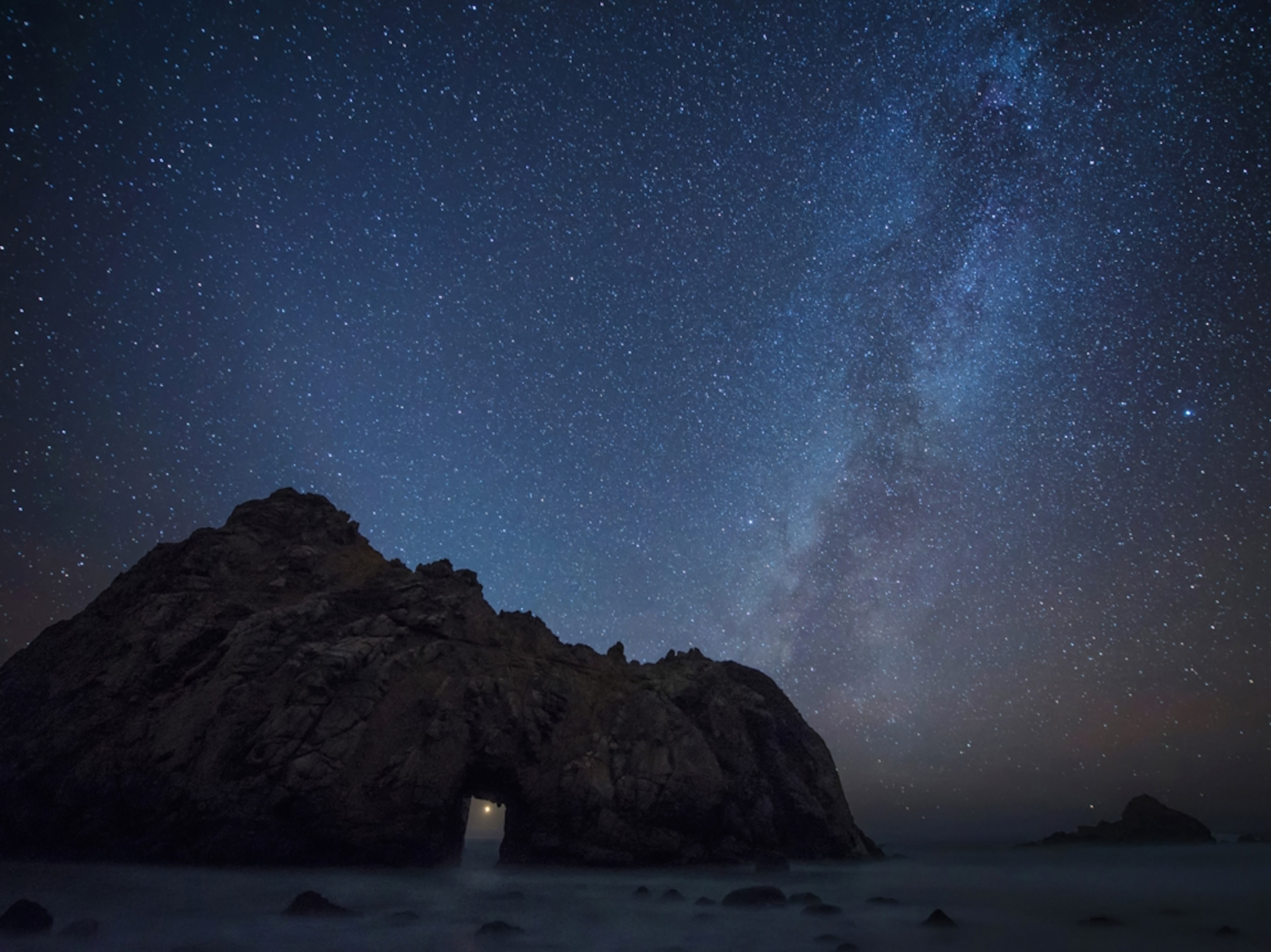a night sky at Pfeiffer Beach, California