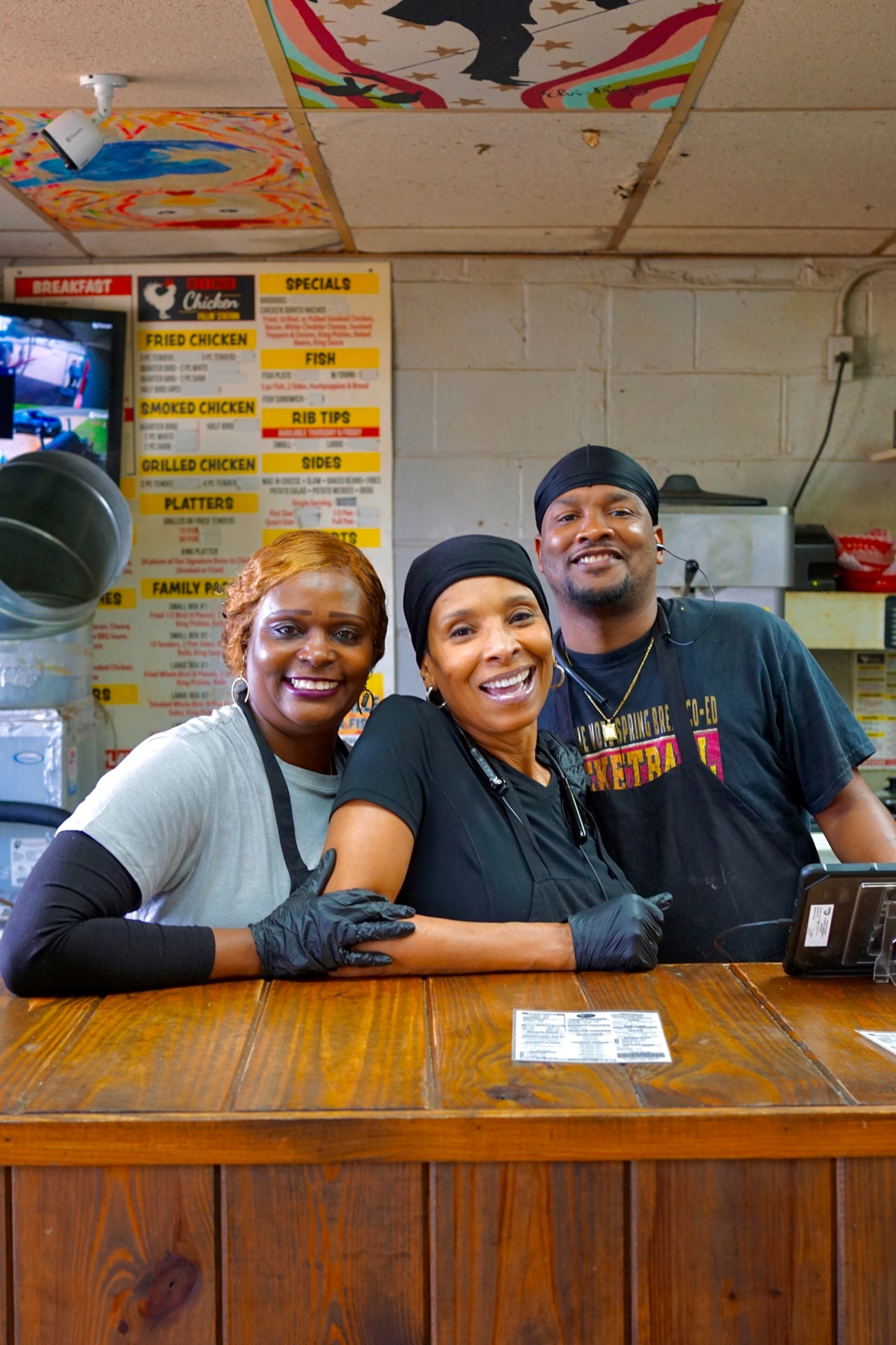 Workers at King Chicken Fillin Station