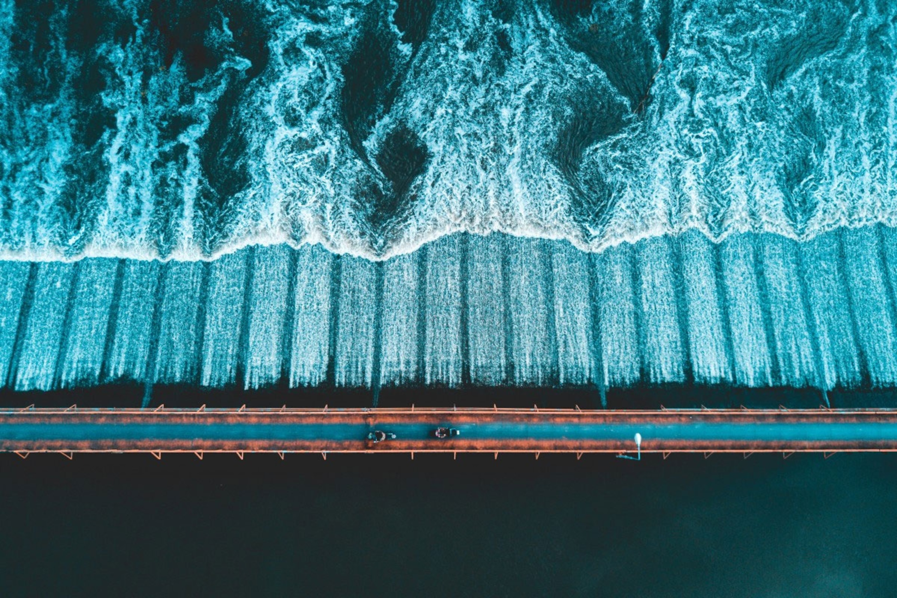 motorbikes crossing a bridge in Thailand