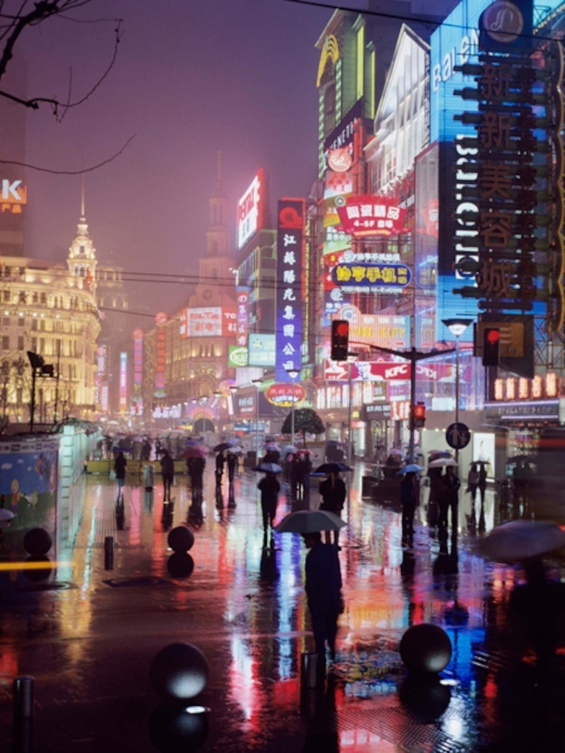 A neon-lit street on a rainy night