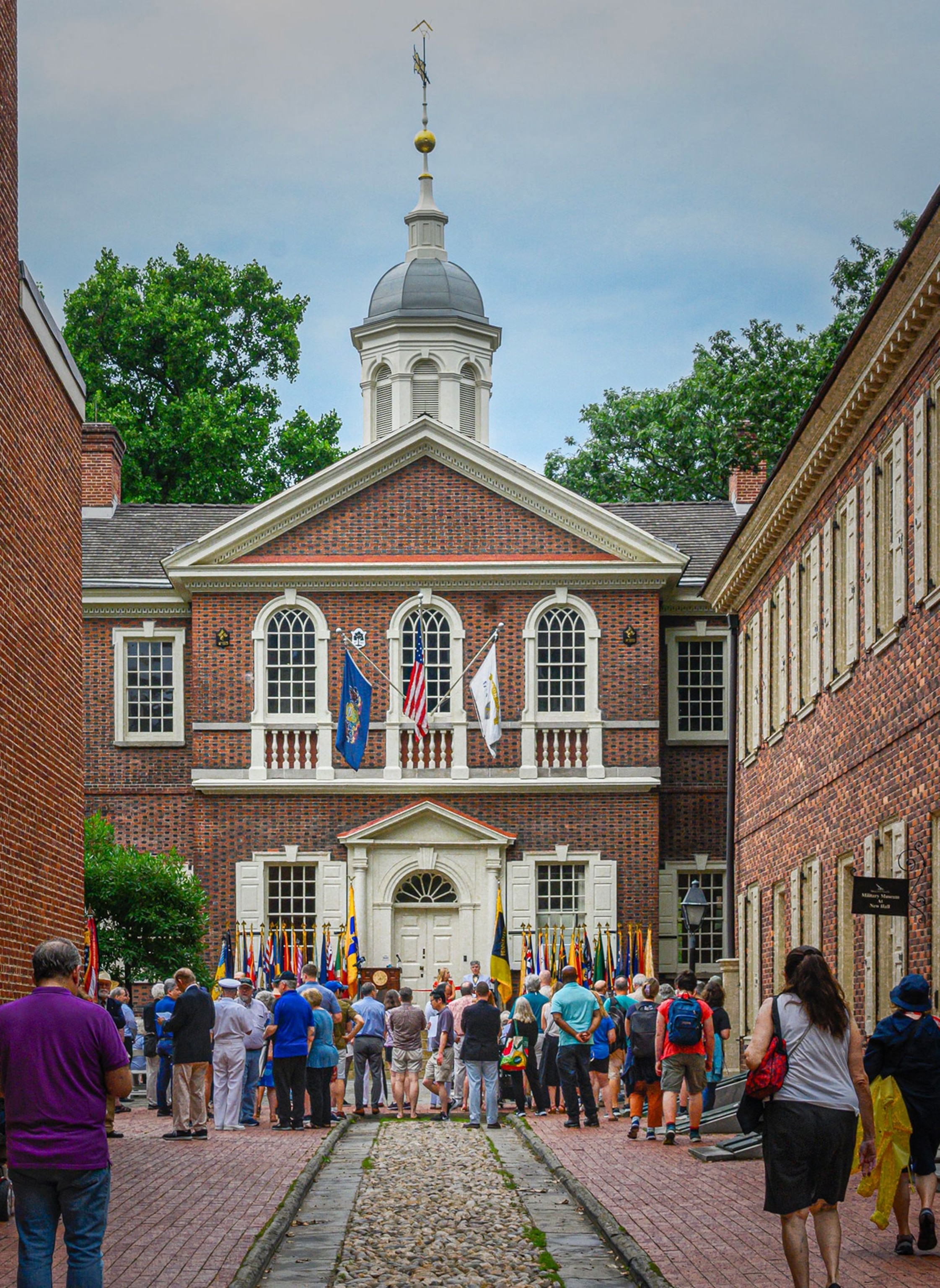 The First Continental Congress convened at Carpenters’ Hall in Philadelphia—a setting associated with common Americans—in September 1774 to debate how to respond to the Intolerable Acts that placed Massachusetts under military rule.