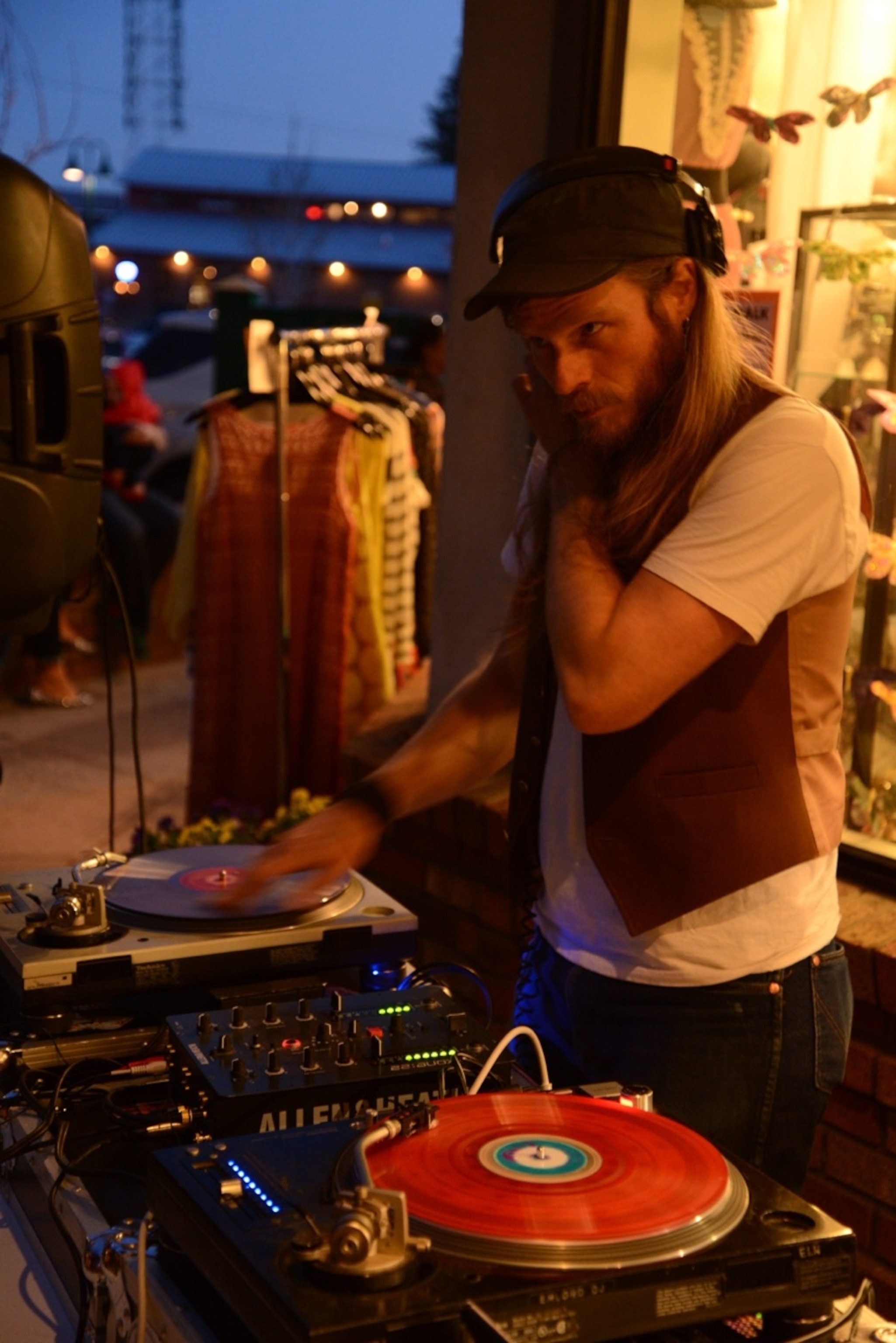 DJ Emmett spins disco records on the sidewalk on Route 66 in Flagstaff, Arizona. (Photo by Andrew Evans, National Geographic)