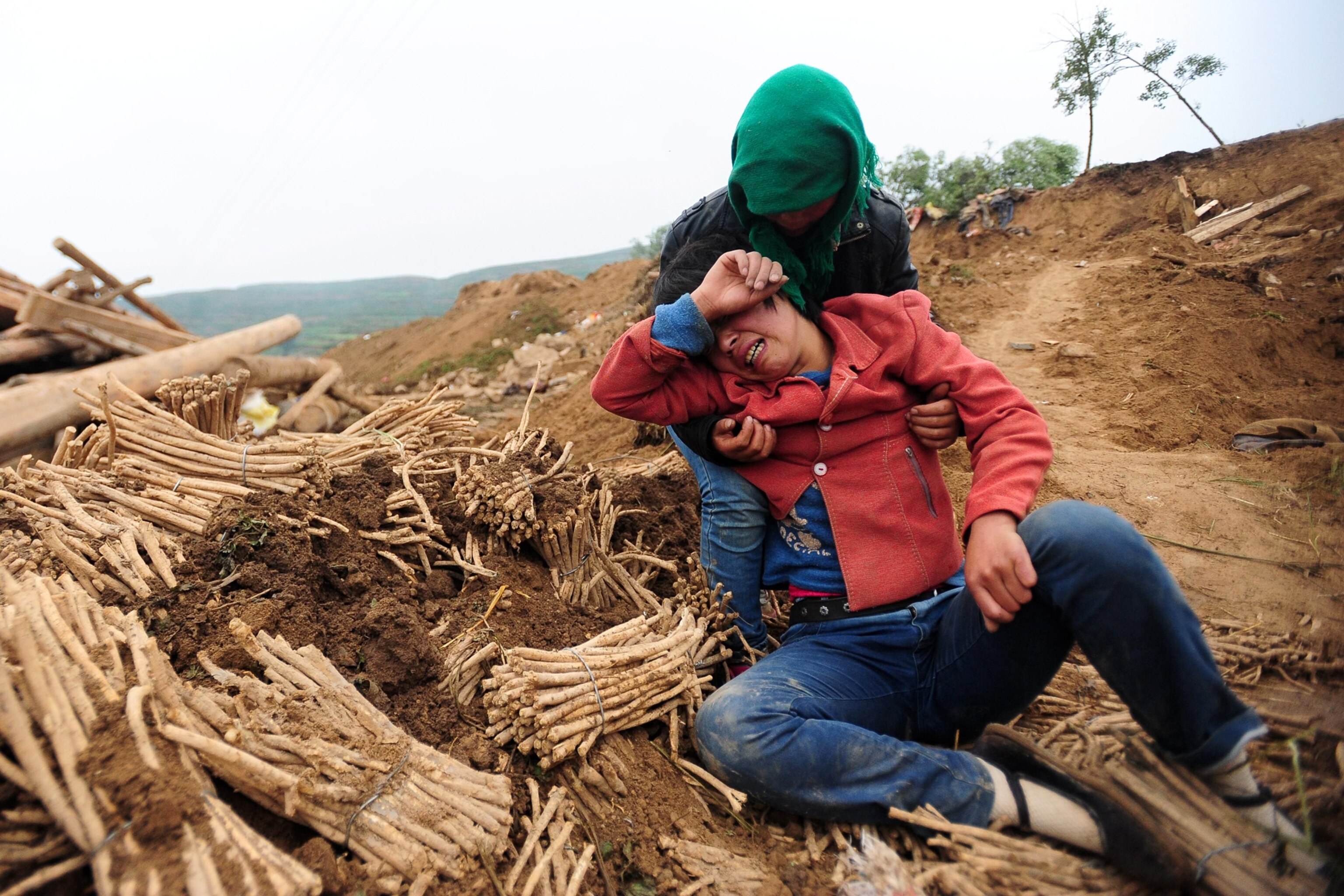 a woman crying after the Chinese earthquake