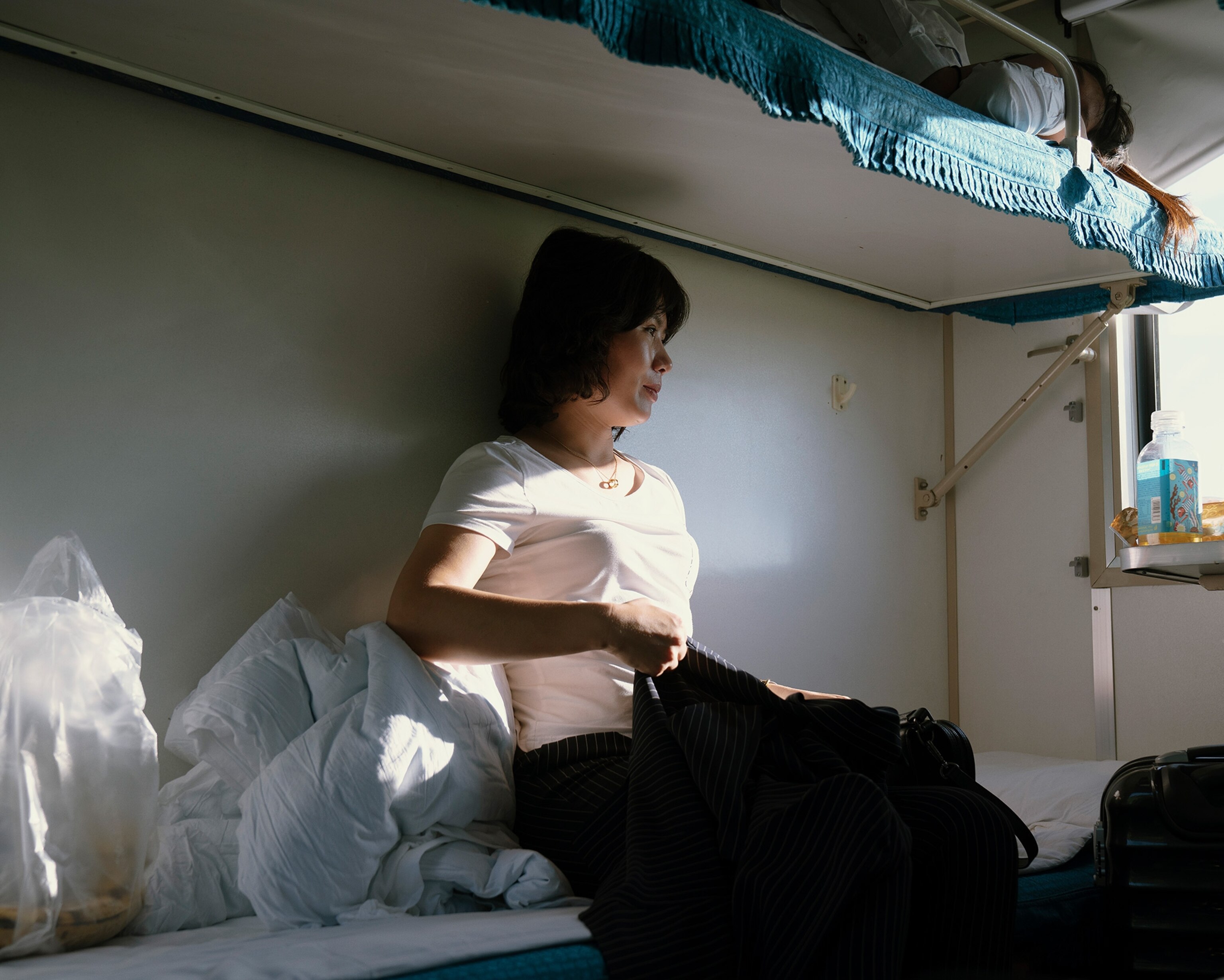 a passenger on a train from Beijing, China to North Korea