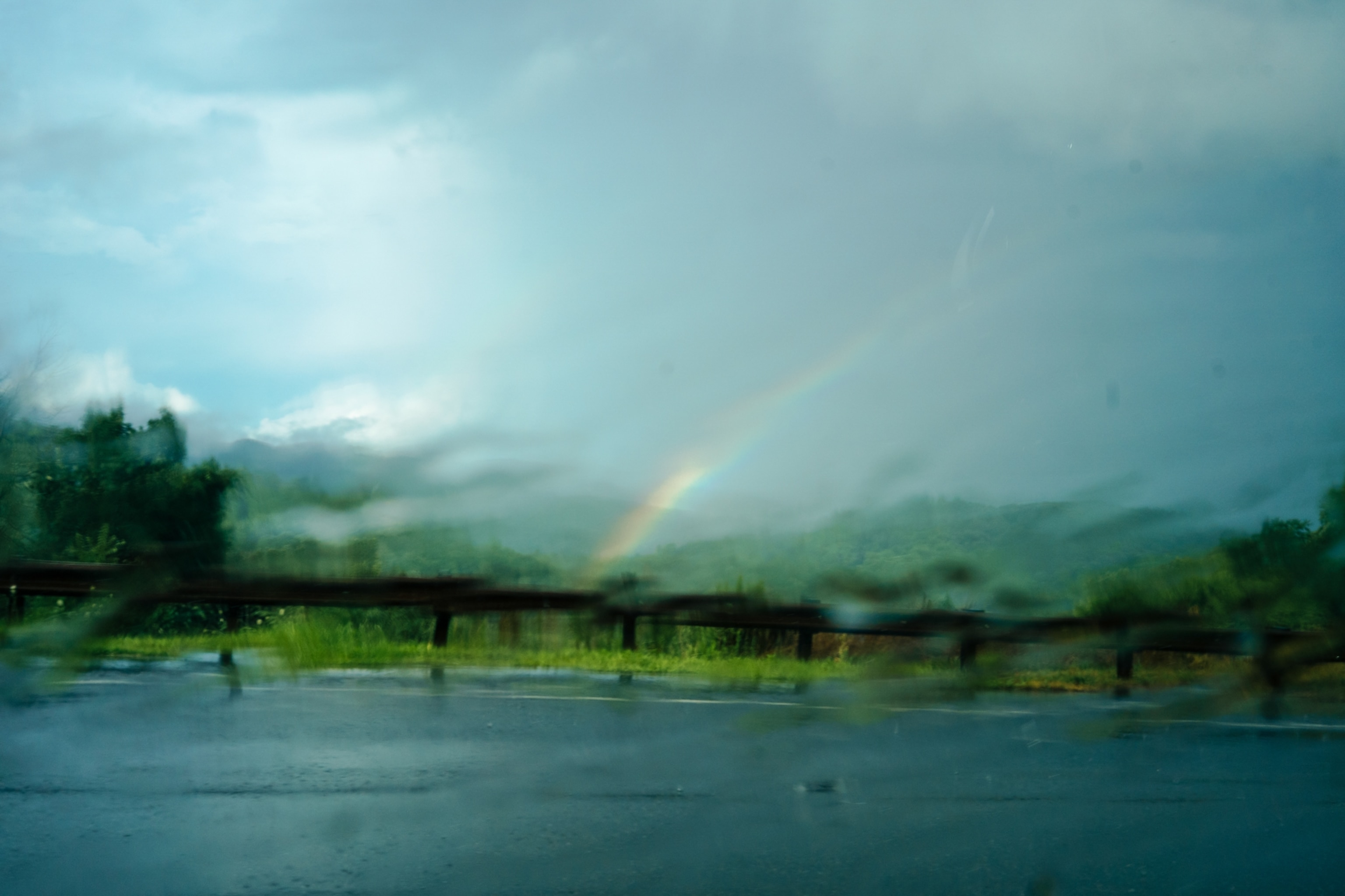Rainbow during a rainstorm on a drive through the blue ridge mountains near Blowing Rock, NC.