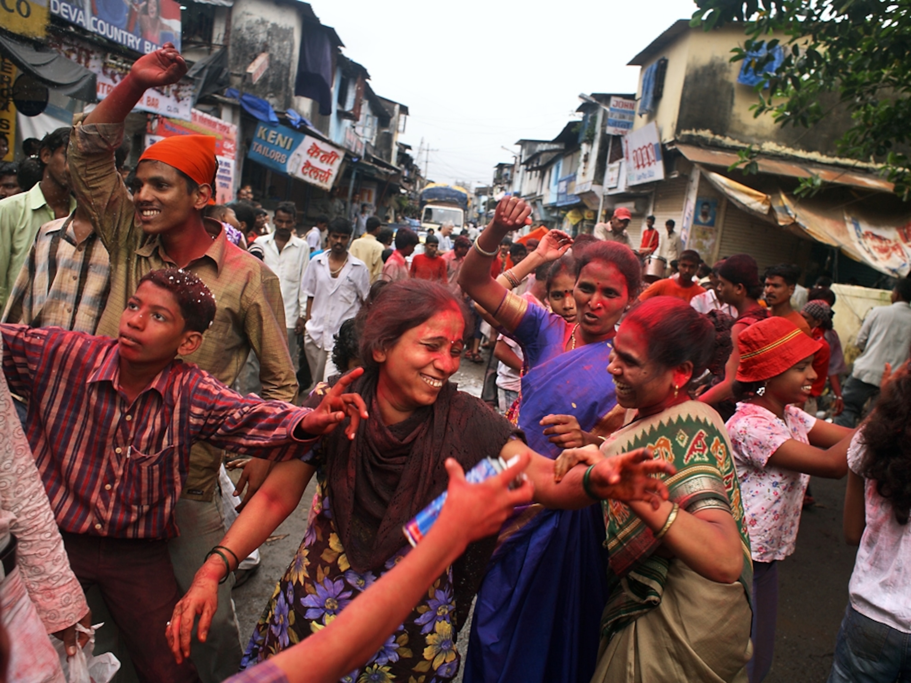 Revelers at festival at an Indian slum