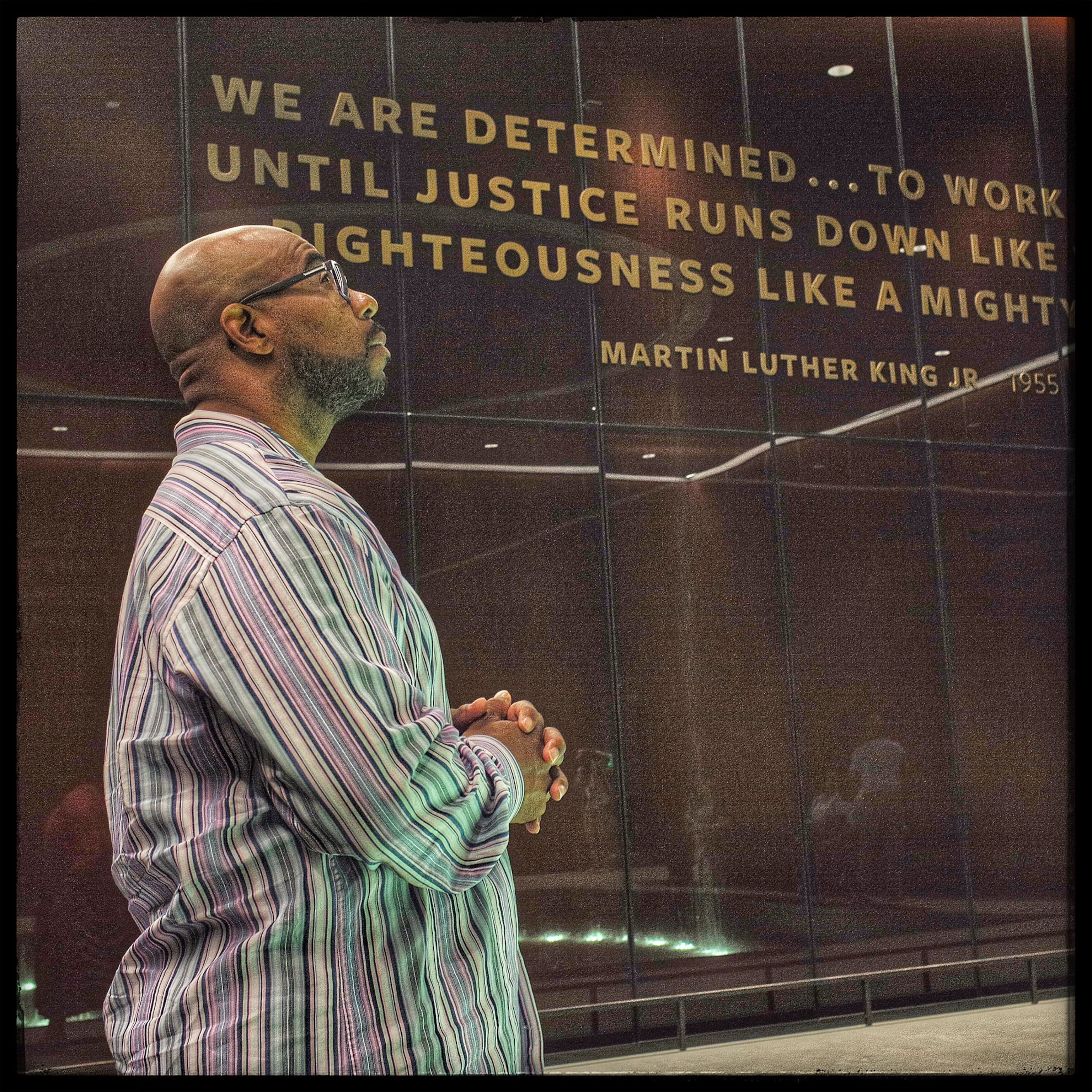 a man in the African American Museum in Washington D.C.