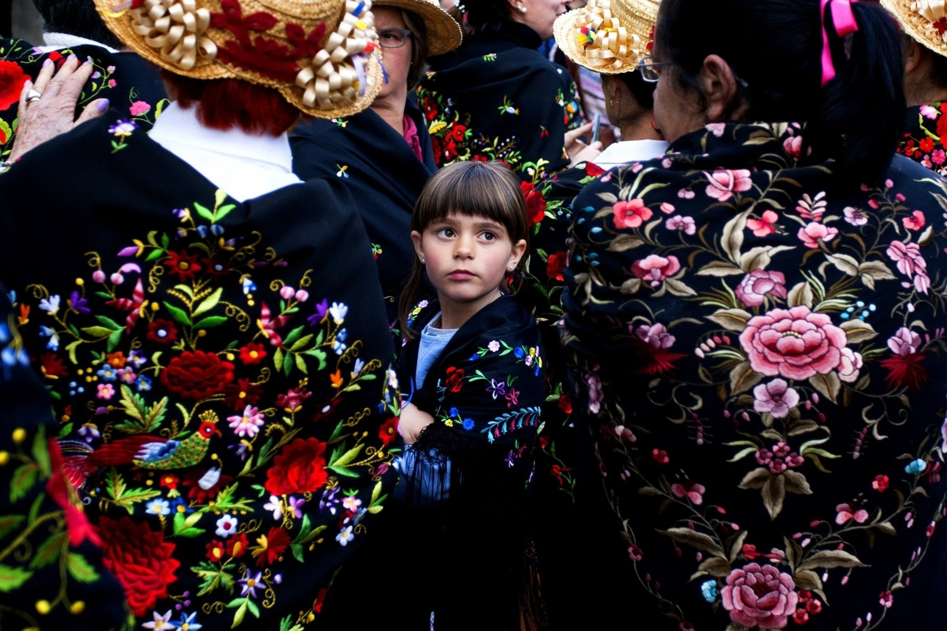 young girl among traditional spanish festival