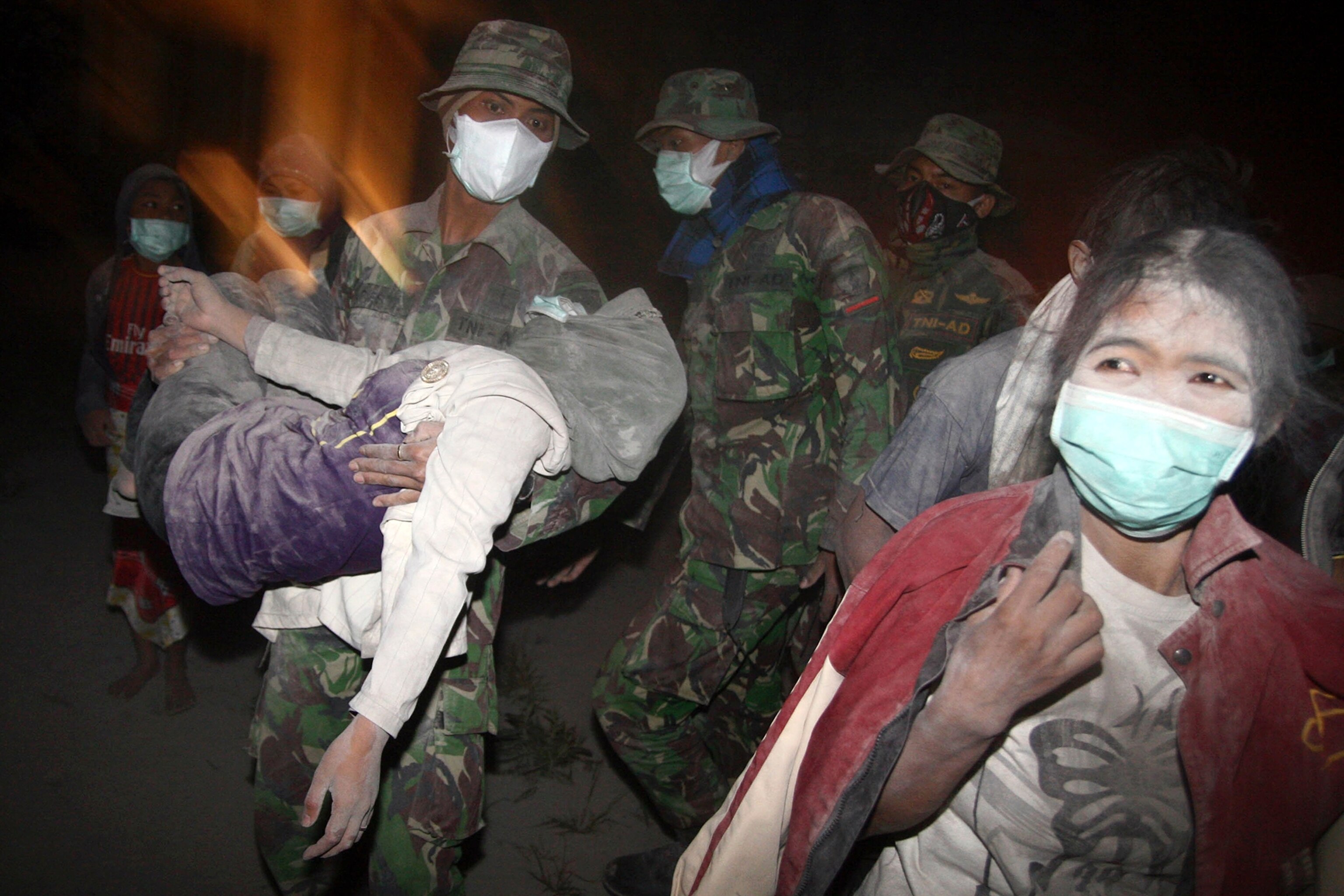 a housing complex covered in ash.