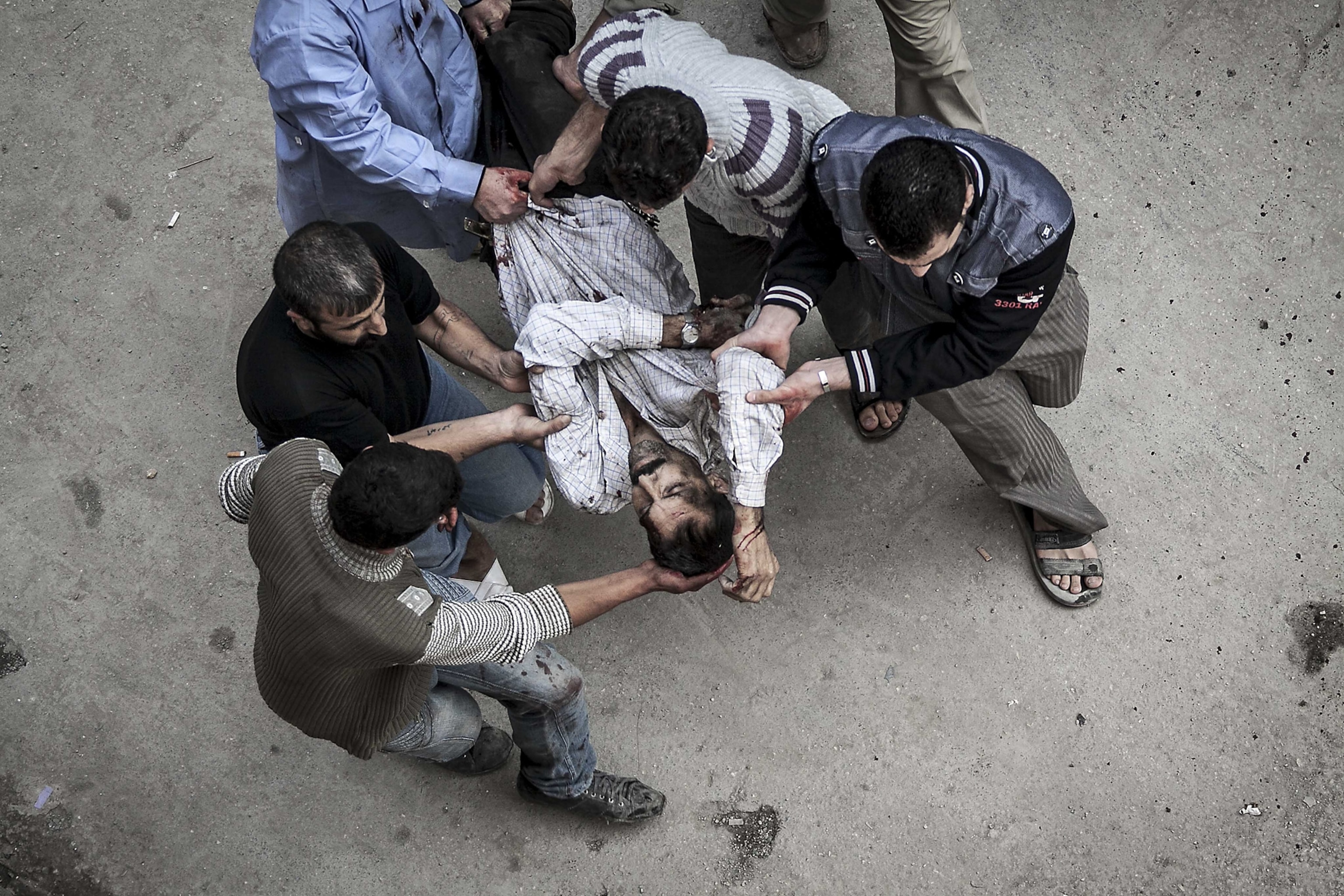 a man being carried to the hospital
