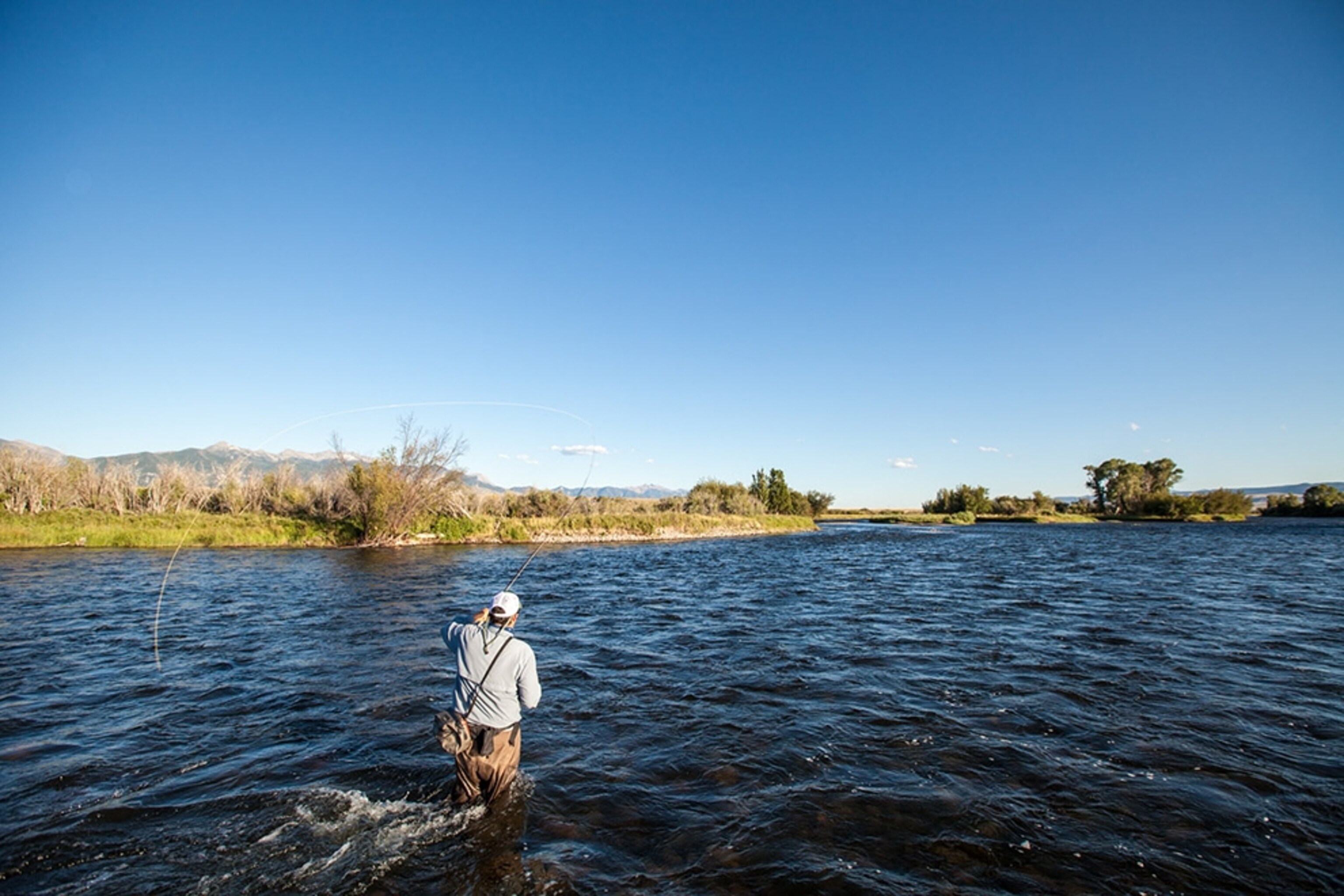 a man fly fishing in Montana