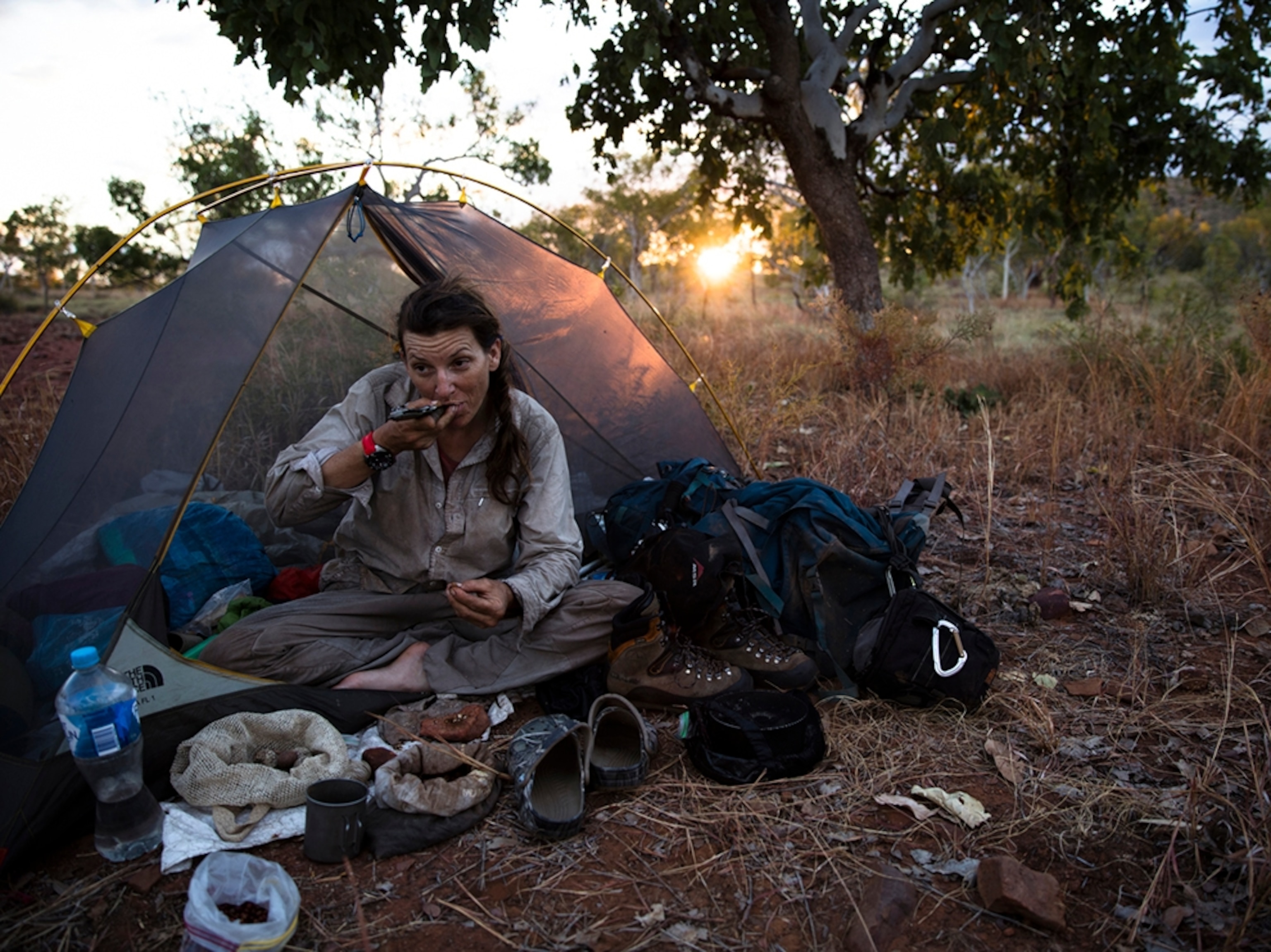 Sarah Marquis eating near her campsite in Western Australia.
