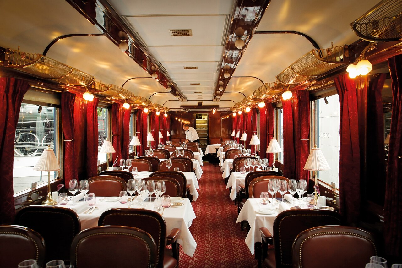 Restored dining cars from the Orient Express, like the one shown here, showcase the art deco features installed after the First World War, including Lalique glass, marquetry, and lacquered paneling.