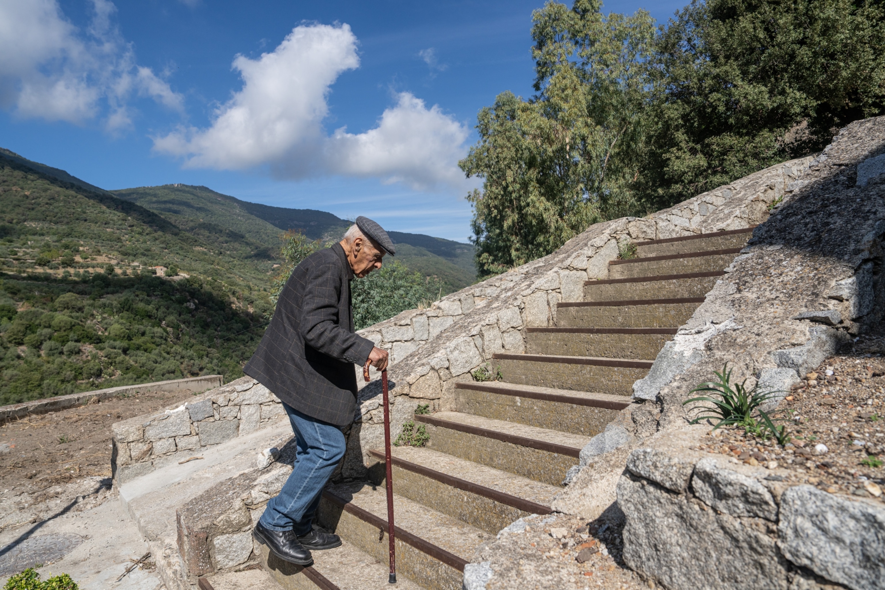 Centenarians in Bolotona stay fit climbing steep hills and stairs