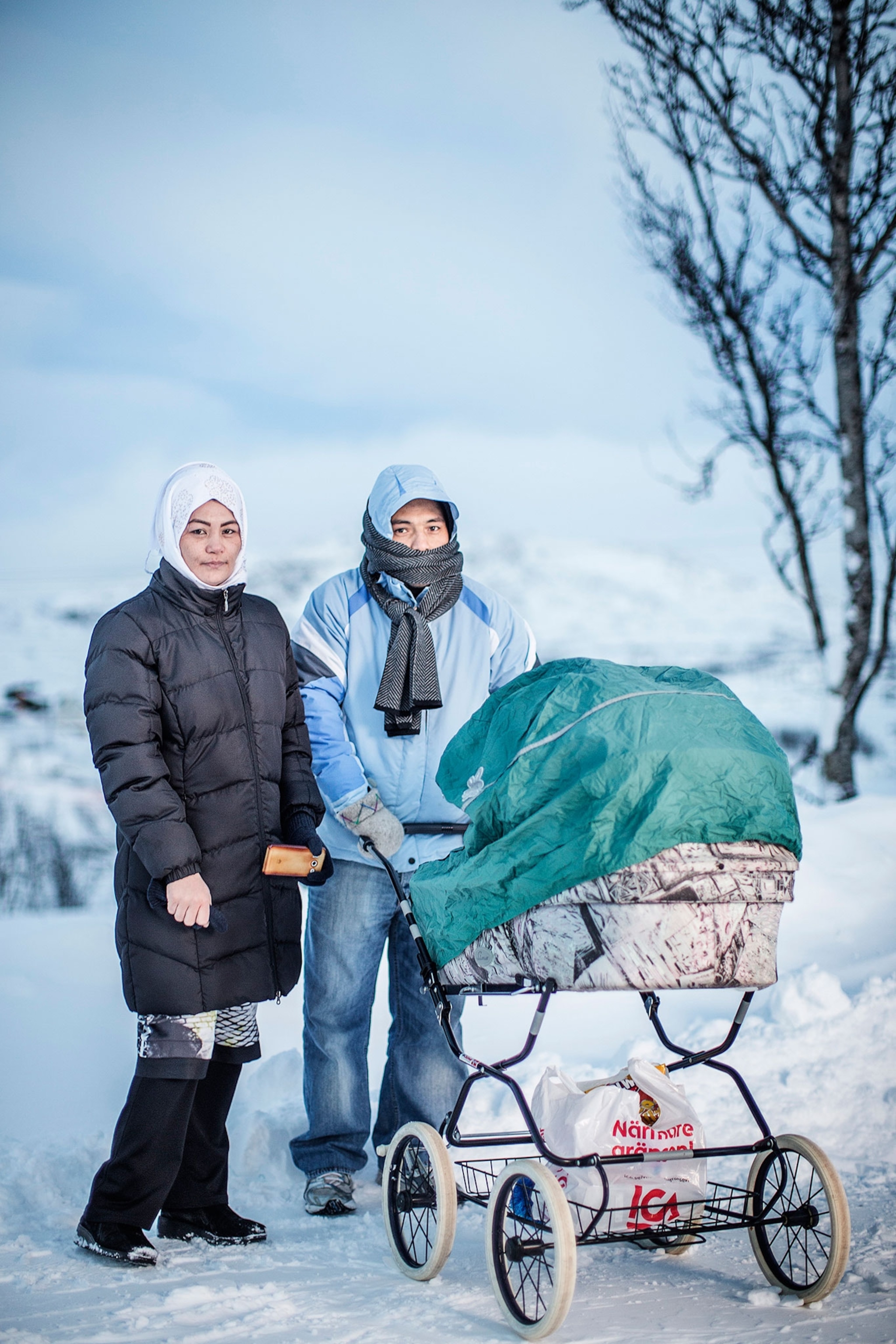 Saker Hossein Nabavi and his wife Sakine and their child