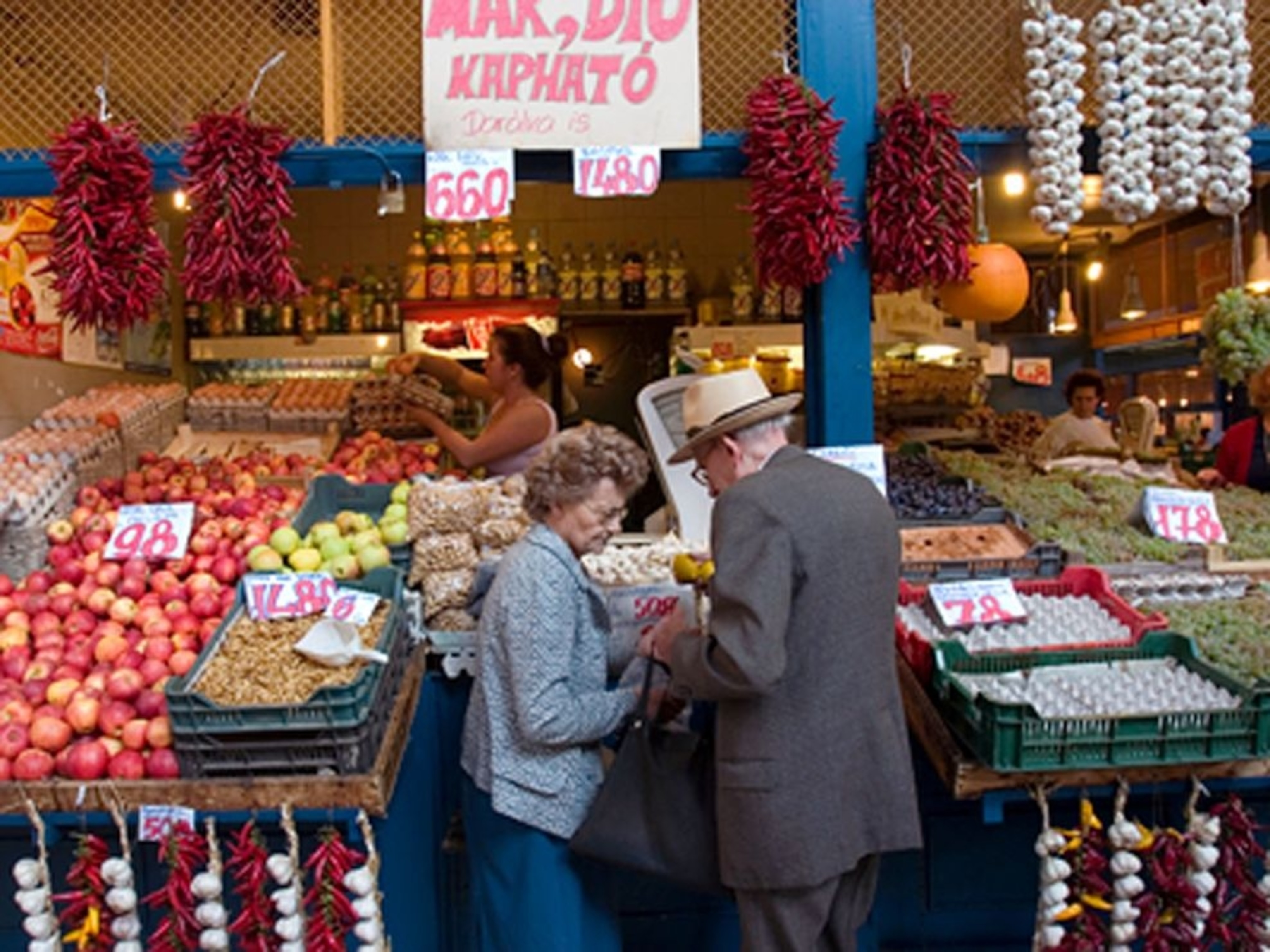 a couple shopping in a Hungarian Market