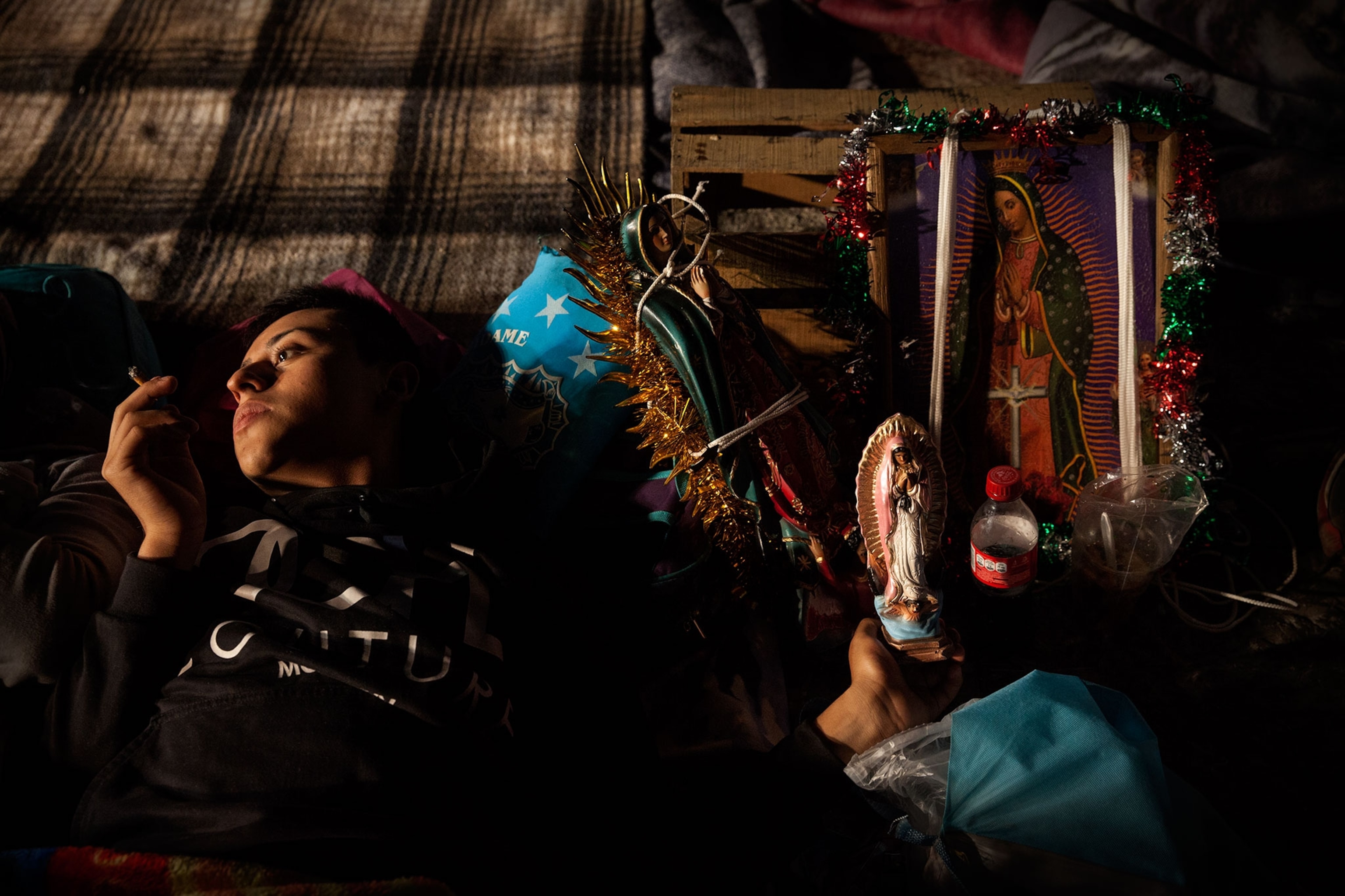 a woman smoking while lying down.