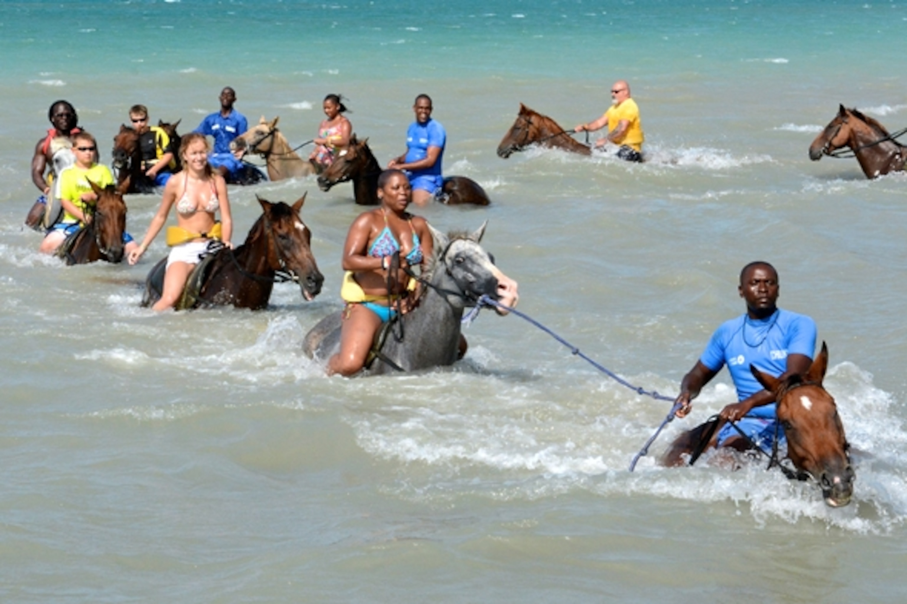 The "Horseback Ride 'N' Swim" tour in action  (Photograph by Rainer Jenss)