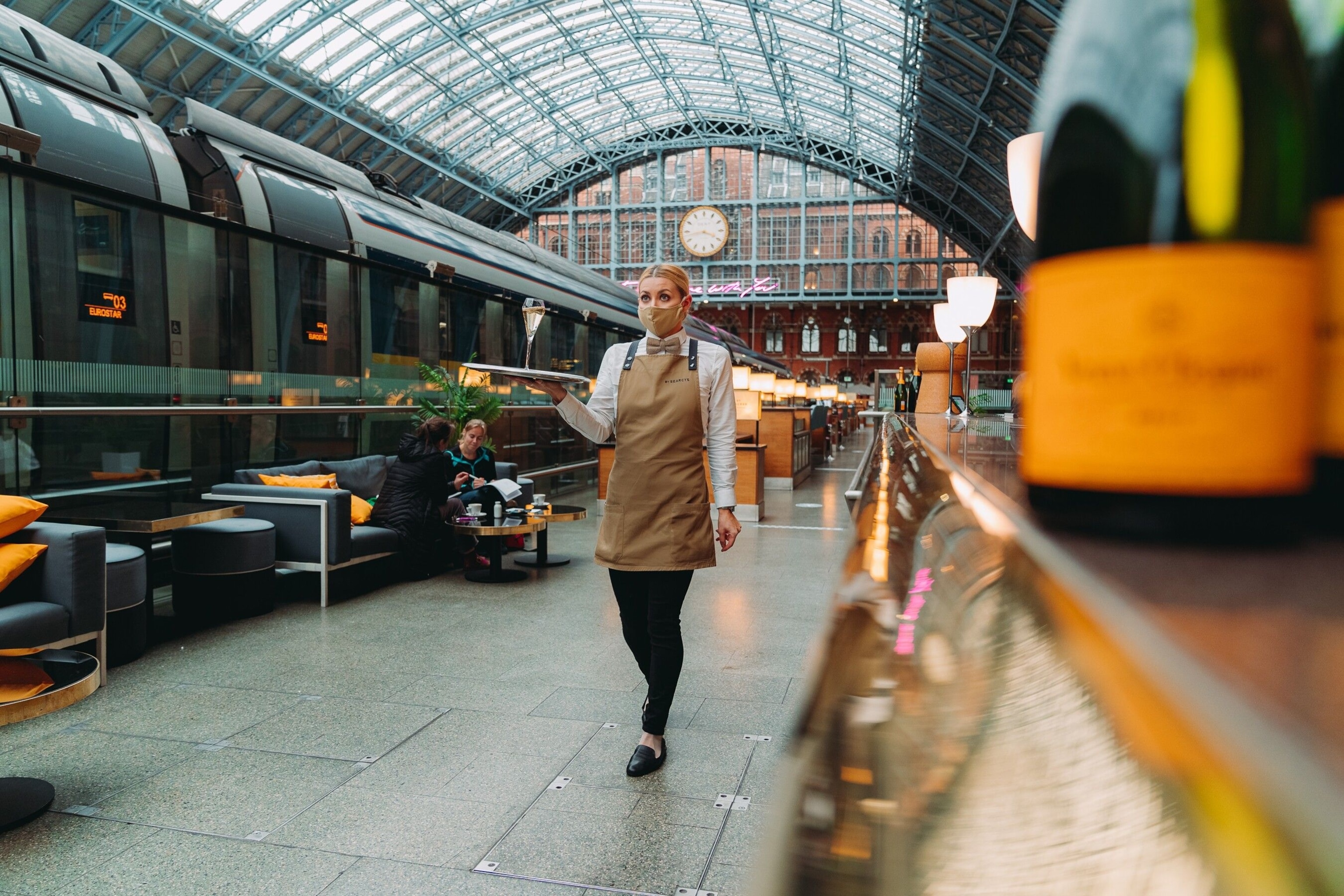 Champagne Bar by Searcys in St Pancras Station offers individual leather booths that seat up to six people, equipped with ‘press for champagne’ buzzers.