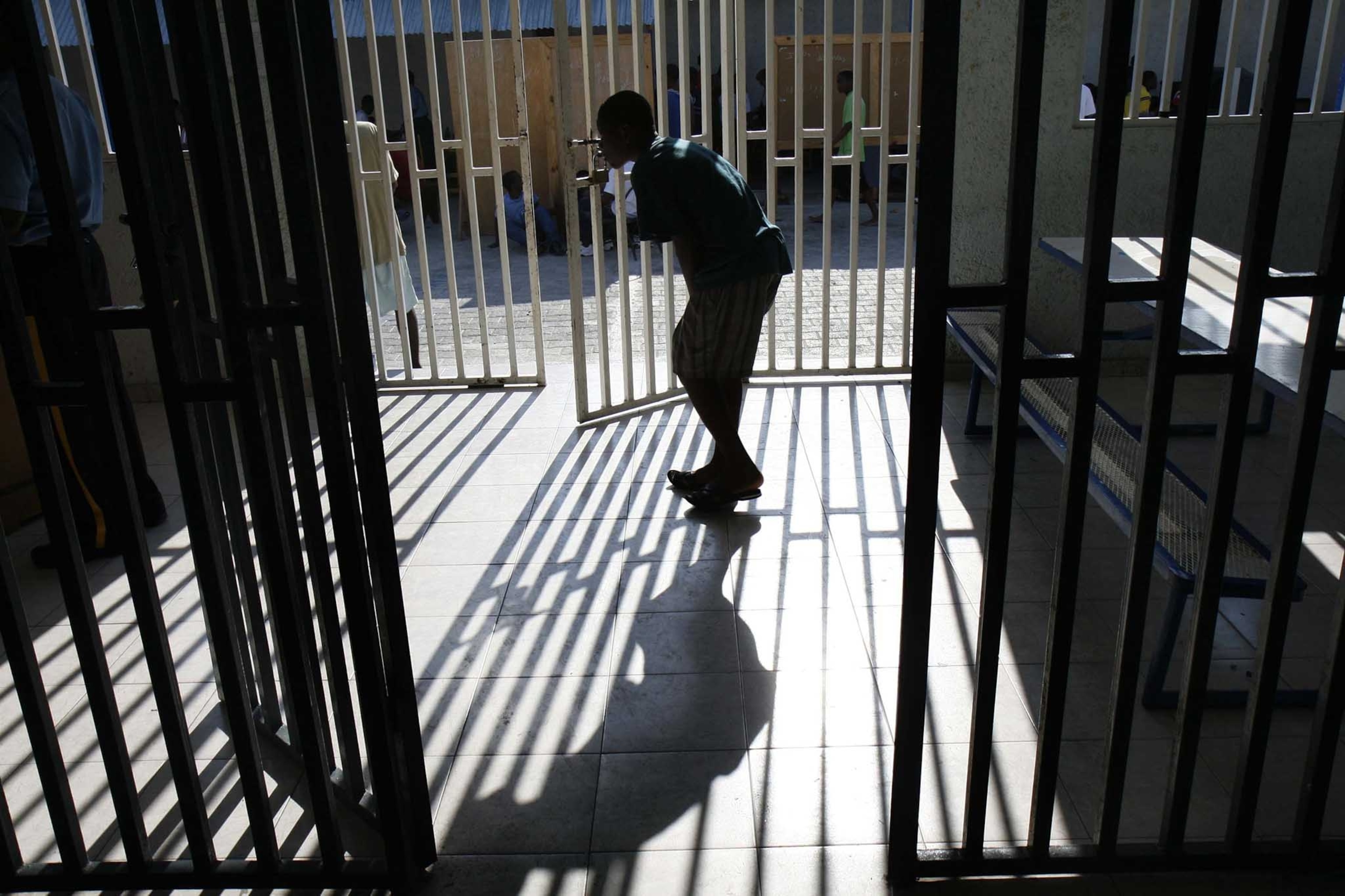The Fort Dimanche prison for boys houses 129 boys ranging from age 7 -16. Delmas section of Port Au Prince , Haiti. The only main entrance to the prison has a double doors.